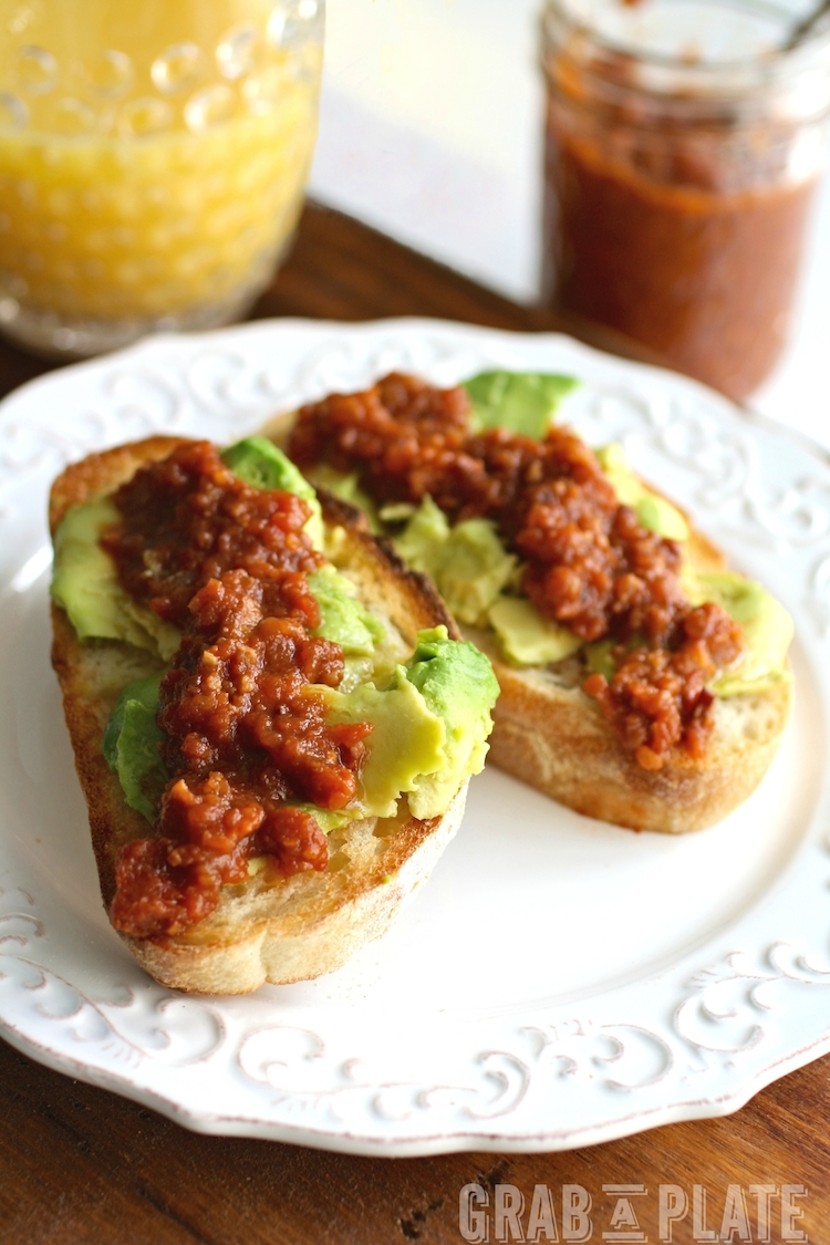 Tomato-Bacon Jam with Avocado Toast is a simple, yet indulgent dish perfect for breakfast