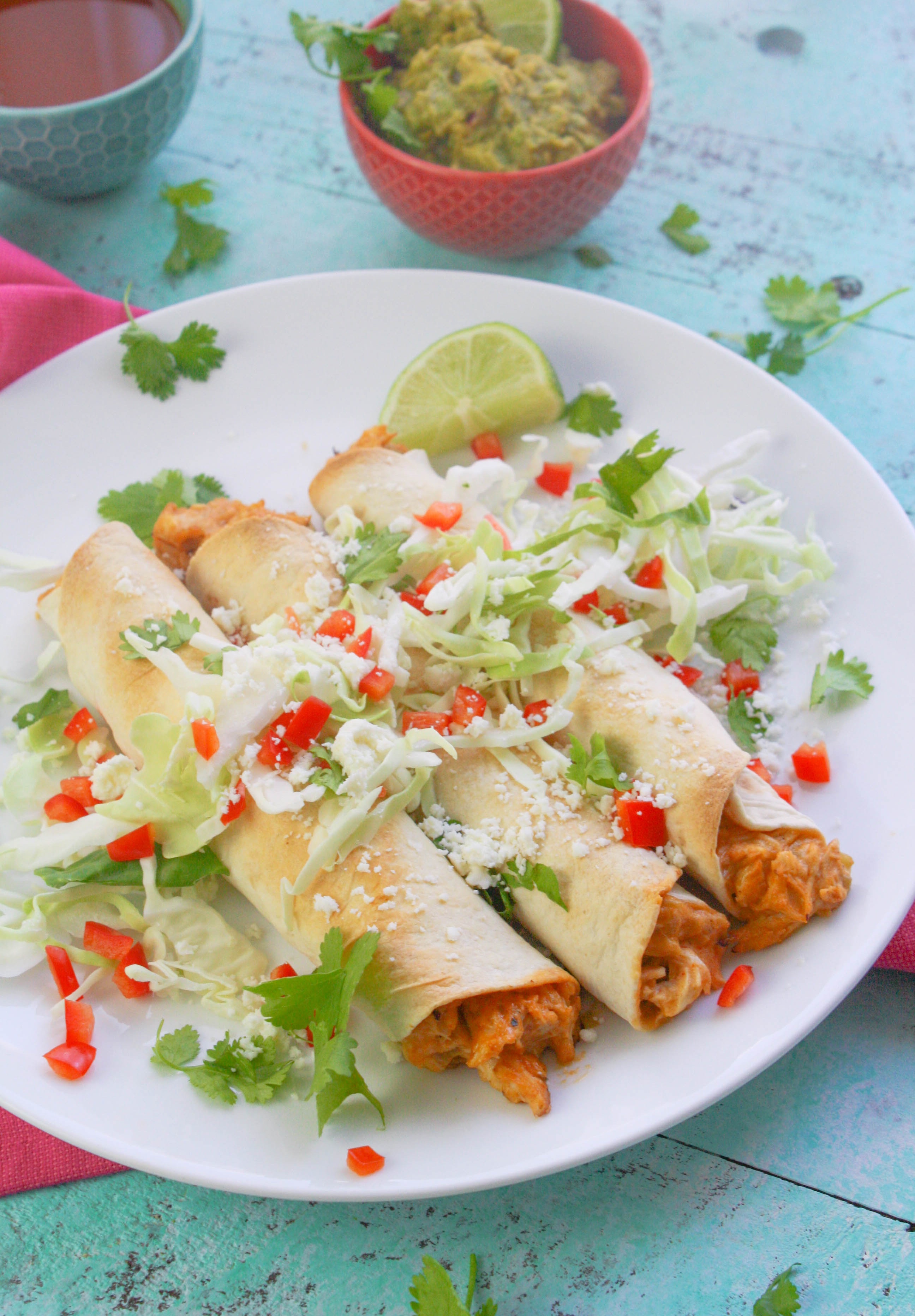 Baked Chicken and Green Chile Taquitos are perfect as a snack or as part of a light meal. Baked Chicken and Green Chile Taquitos are so easy to make and fun to serve!