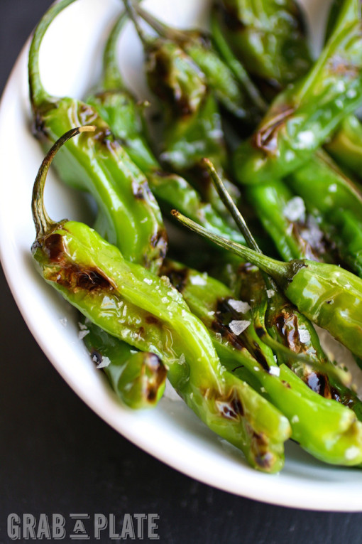 Delight in a bowl of Blistered Shishito Peppers with Smoky Paprika Aioli