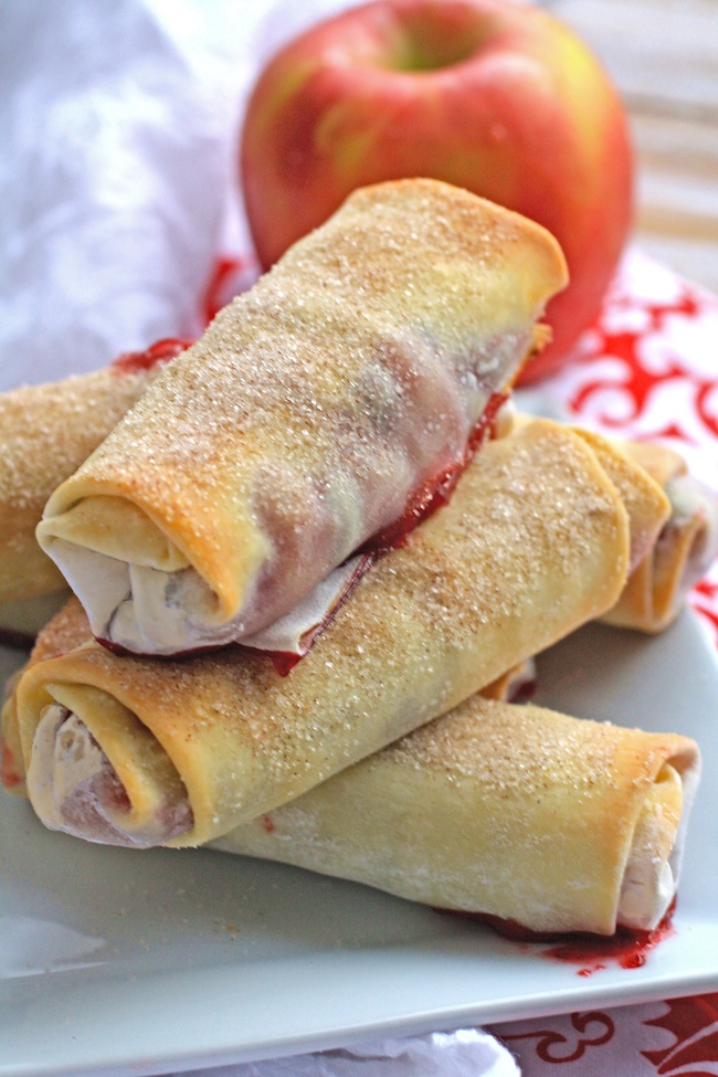 Cranberry-apple Pie Spring Rolls piled on a plate