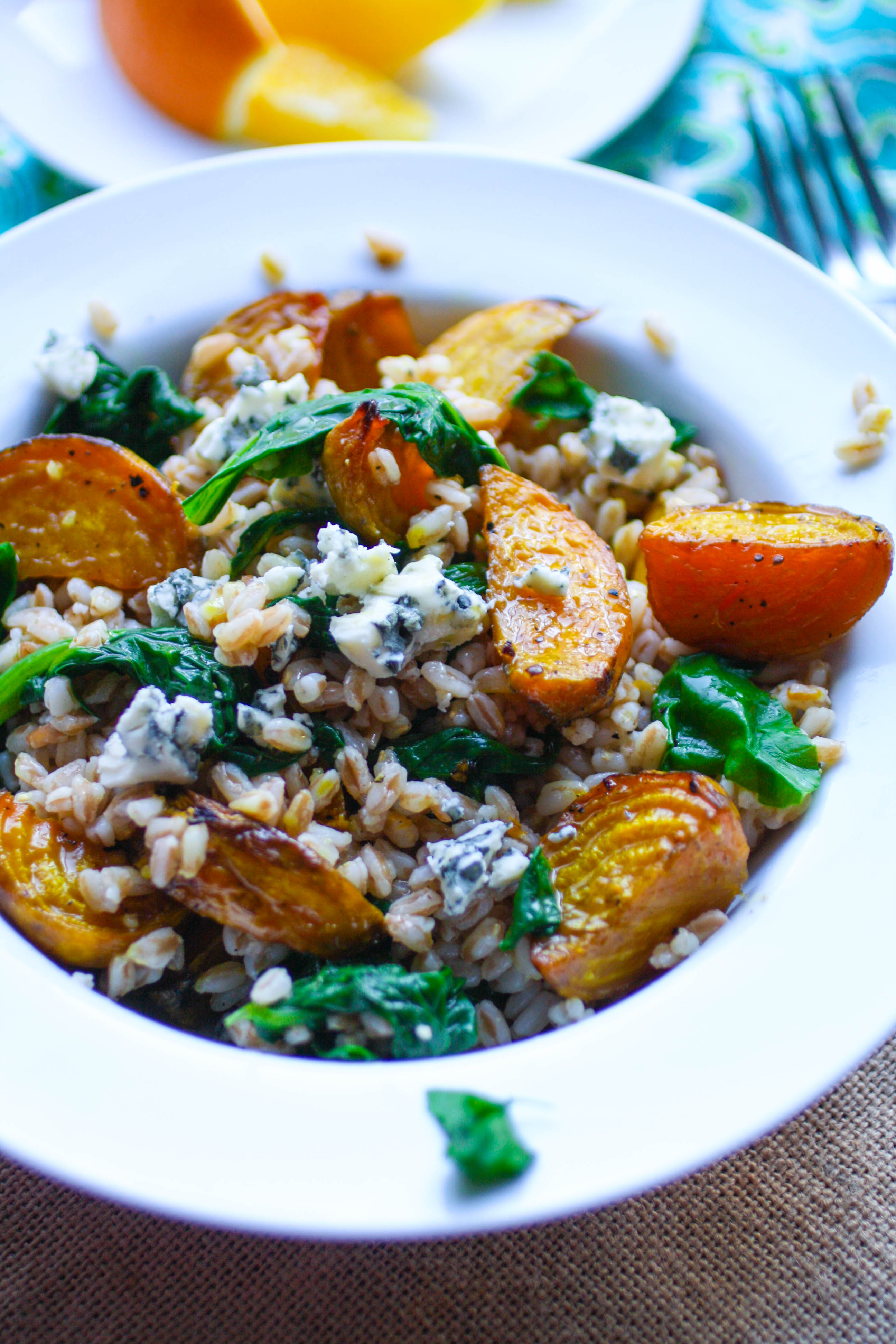 Roasted Farro & Beet Salad is perfect this time of year. It's warm and hearty and delicious! You'll love this winter salad with farro and beets!