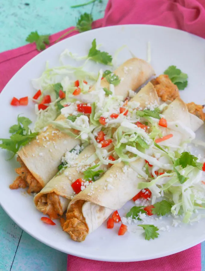 Baked Chicken and Green Chile Taquitos are a restaurant favorite that are easy (and baked) to make at home. Baked Chicken and Green Chile Taquitos are a great snack or light meal option.