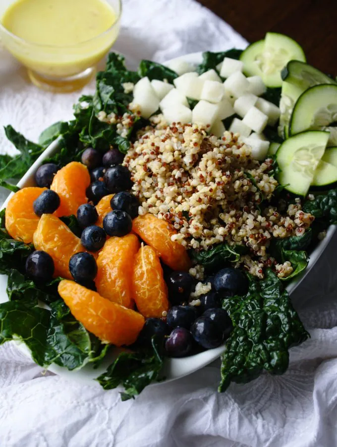 Kale-Quinoa Salad with Orange Vinaigrette is a super-hearty salad. It's easy to make, and has loads of good ingredients!