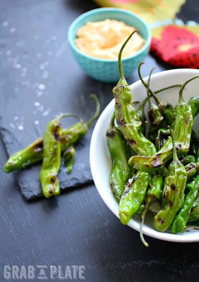 You won't be able to stop eating Blistered Shishito Peppers with Smoky Paprika Aioli