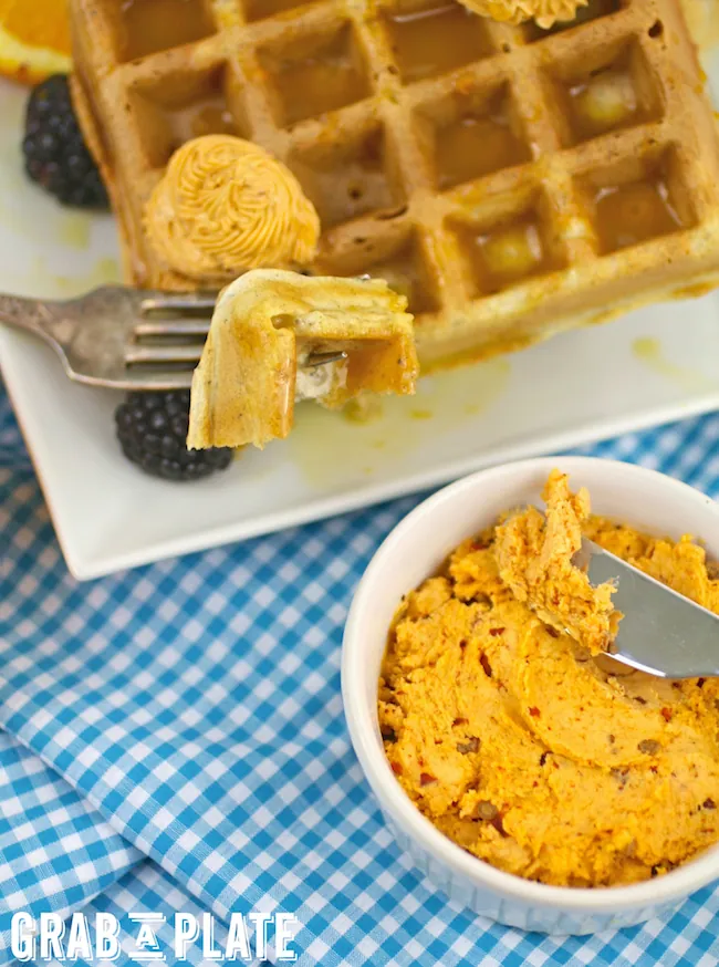 You'll love every bite of Blue Cornmeal Waffles with Chipotle Butter and Orange Syrup