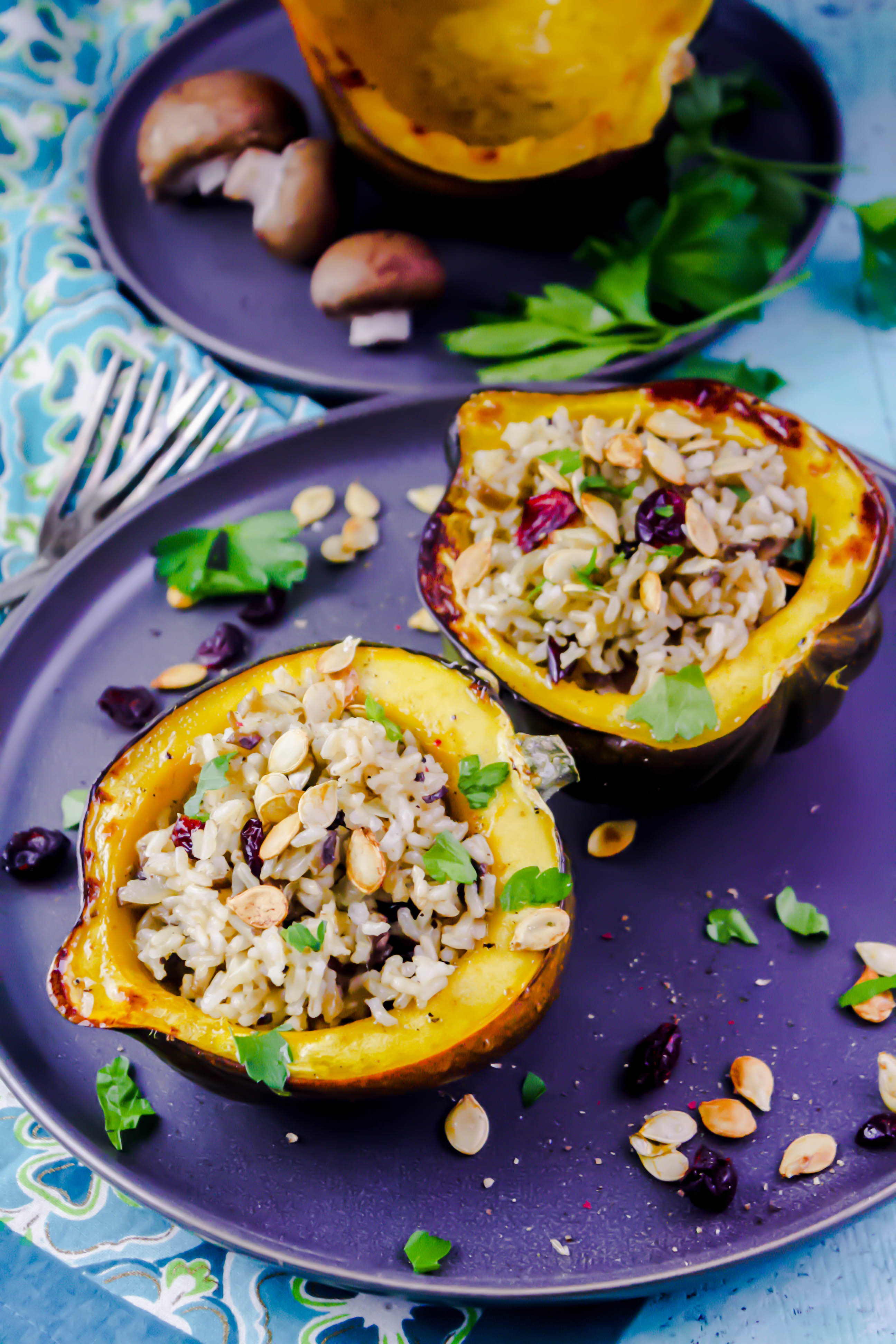 Acorn Squash Stuffed with Brown Rice, Mushrooms, and Cranberries is a great winter dish! You'll enjoy Acorn Squash Stuffed with Brown Rice, Mushrooms, and Cranberries anytime.
