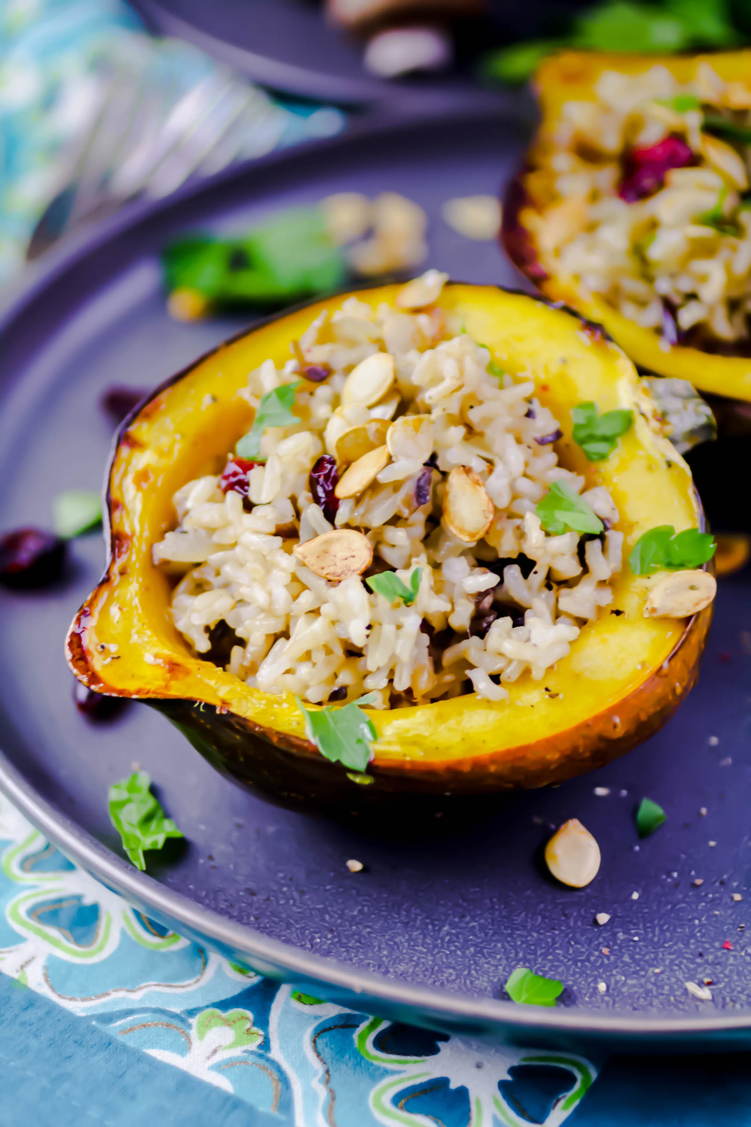 Acorn Squash Stuffed with Brown Rice, Mushrooms, and Cranberries is a lovely meal. Acorn Squash Stuffed with Brown Rice, Mushrooms, and Cranberries is a fun dish to serve -- and it tastes great, too!