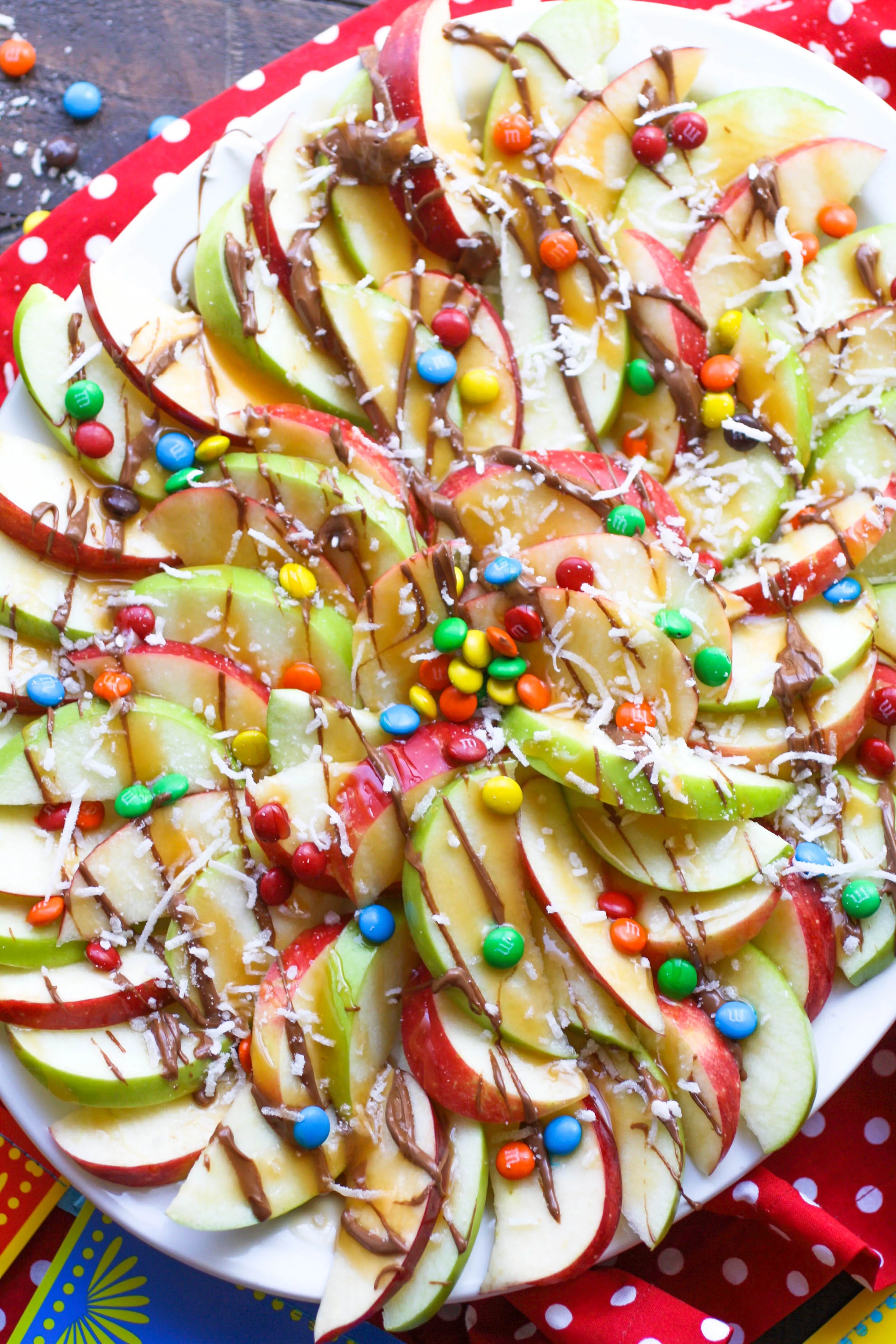 Apple nachos with chocolate & caramel drizzle are festive and fun any day of the week!