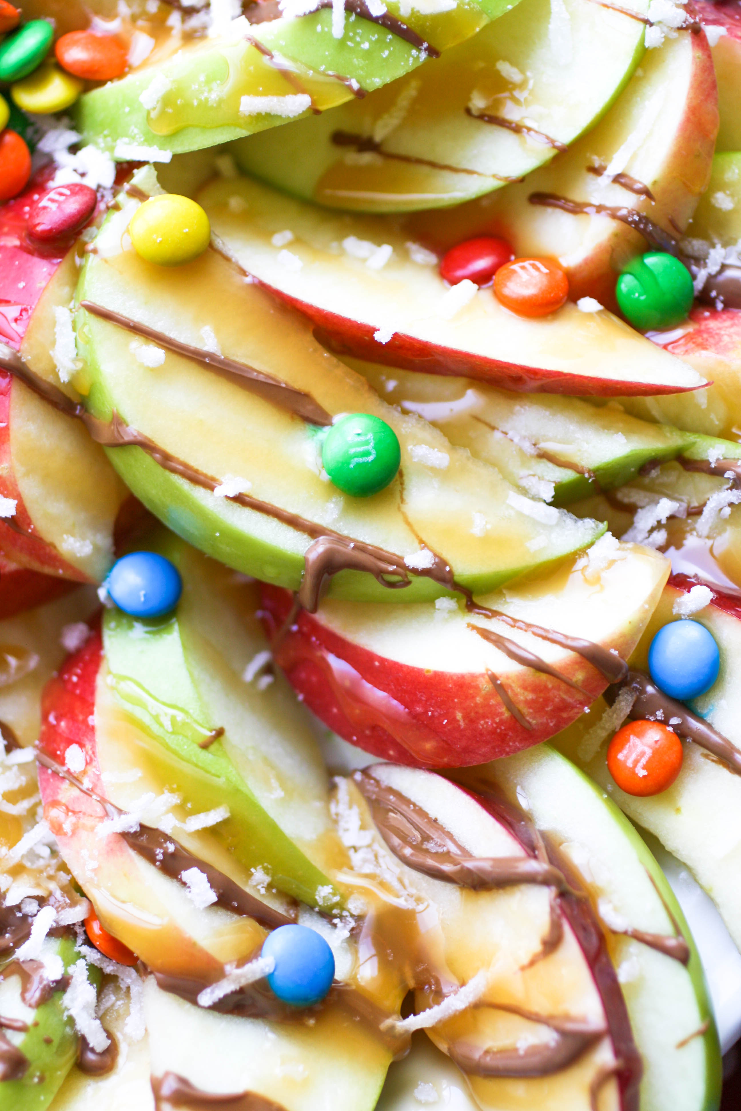 Apple nachos with chocolate & caramel drizzle are a simple, tasty treat for any day! Everyone will love these "nachos!"