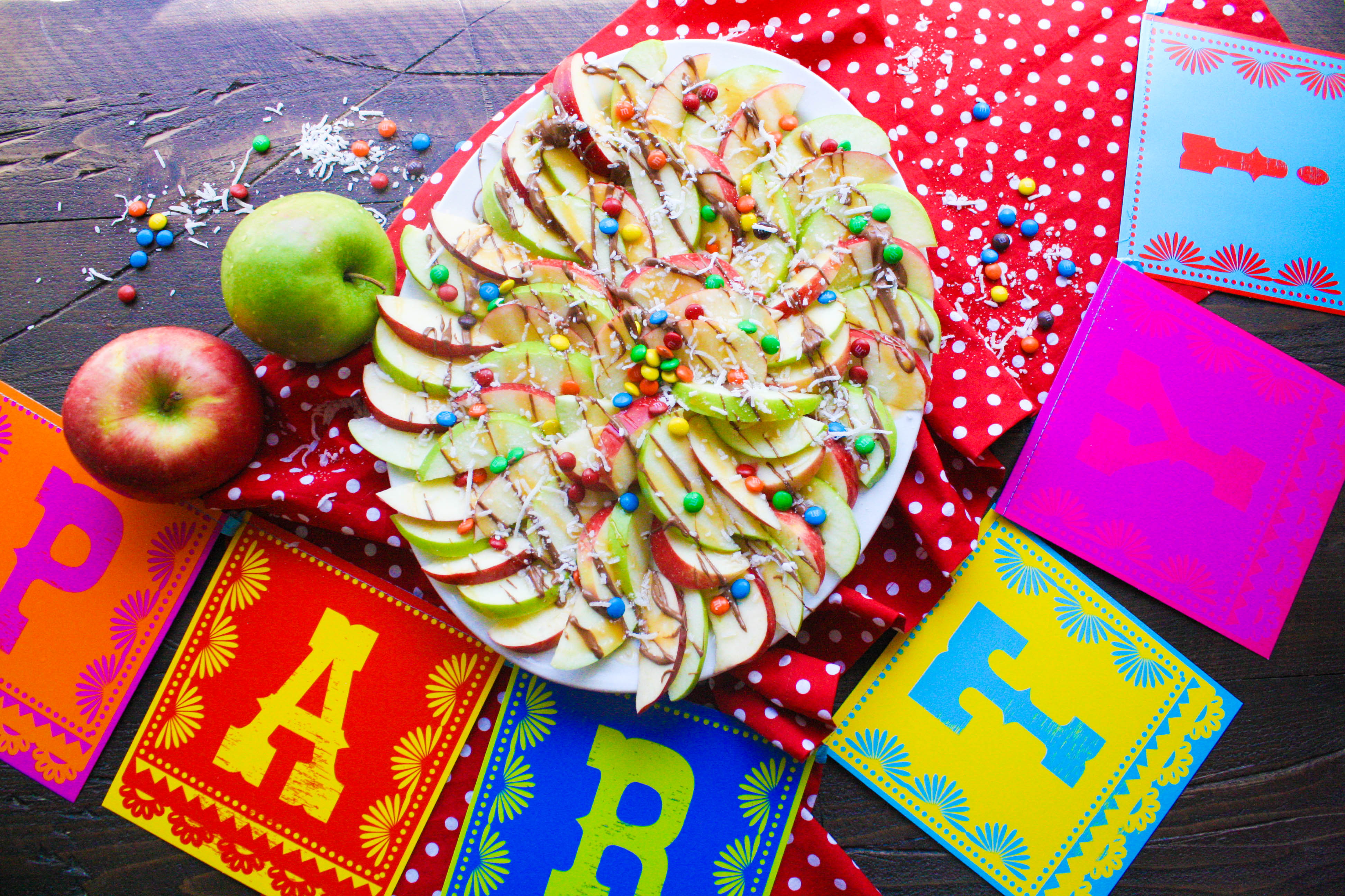 Apple nachos with chocolate & caramel drizzle are festive, easy to make, and so tasty!