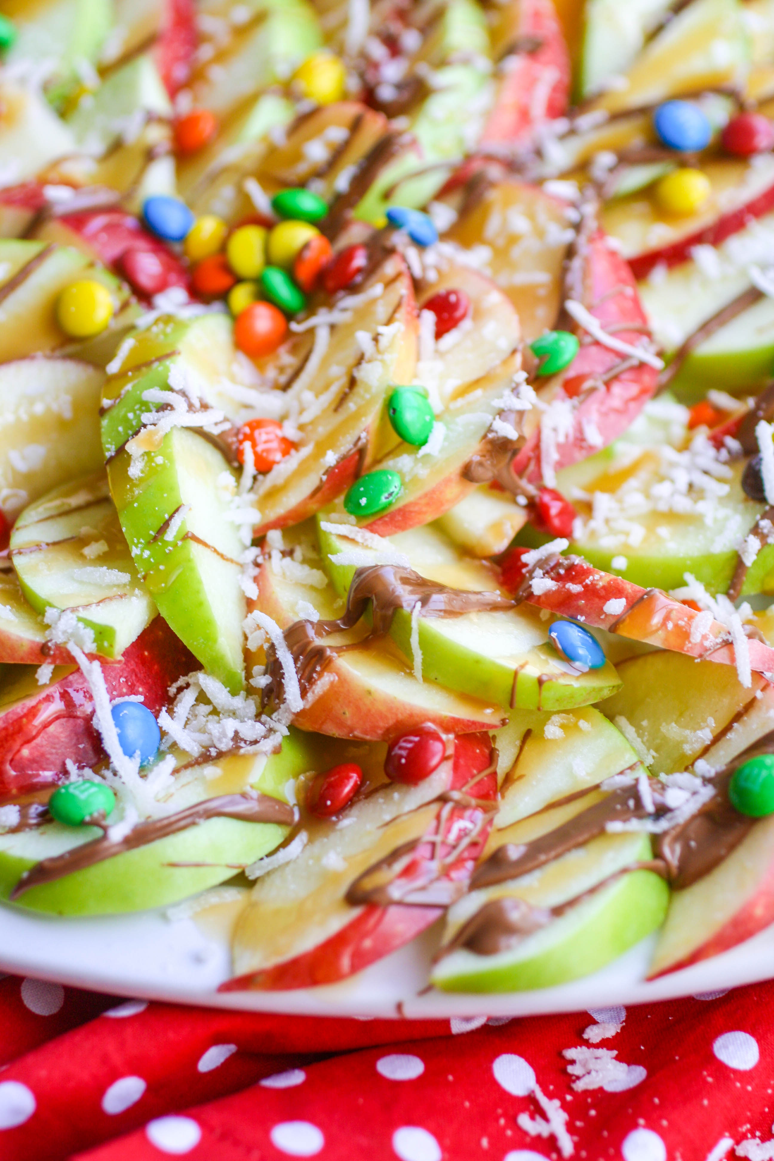 Apple nachos with chocolate & caramel drizzle are tasty and fun to serve!