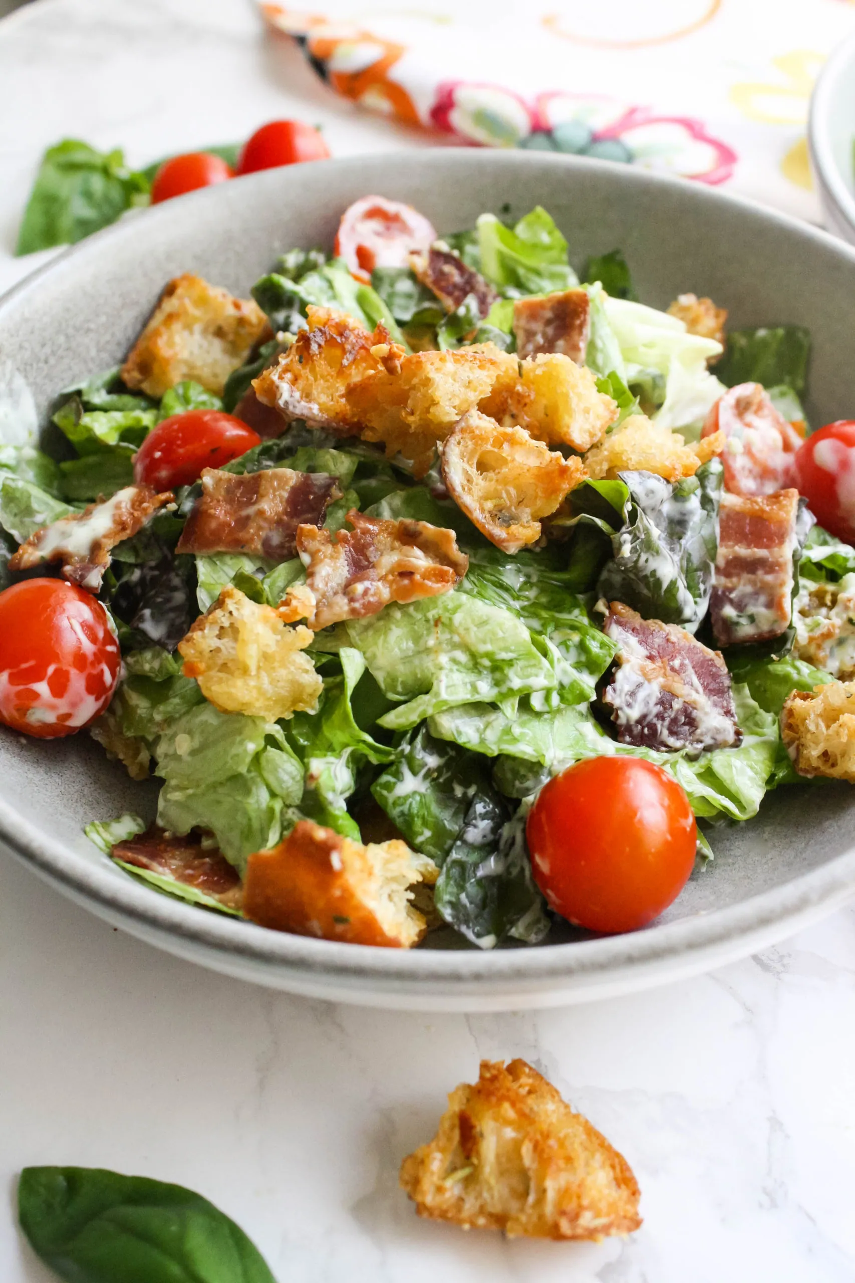 Easy salad recipes include this BLT Salad with Garlic-Basil Dressing