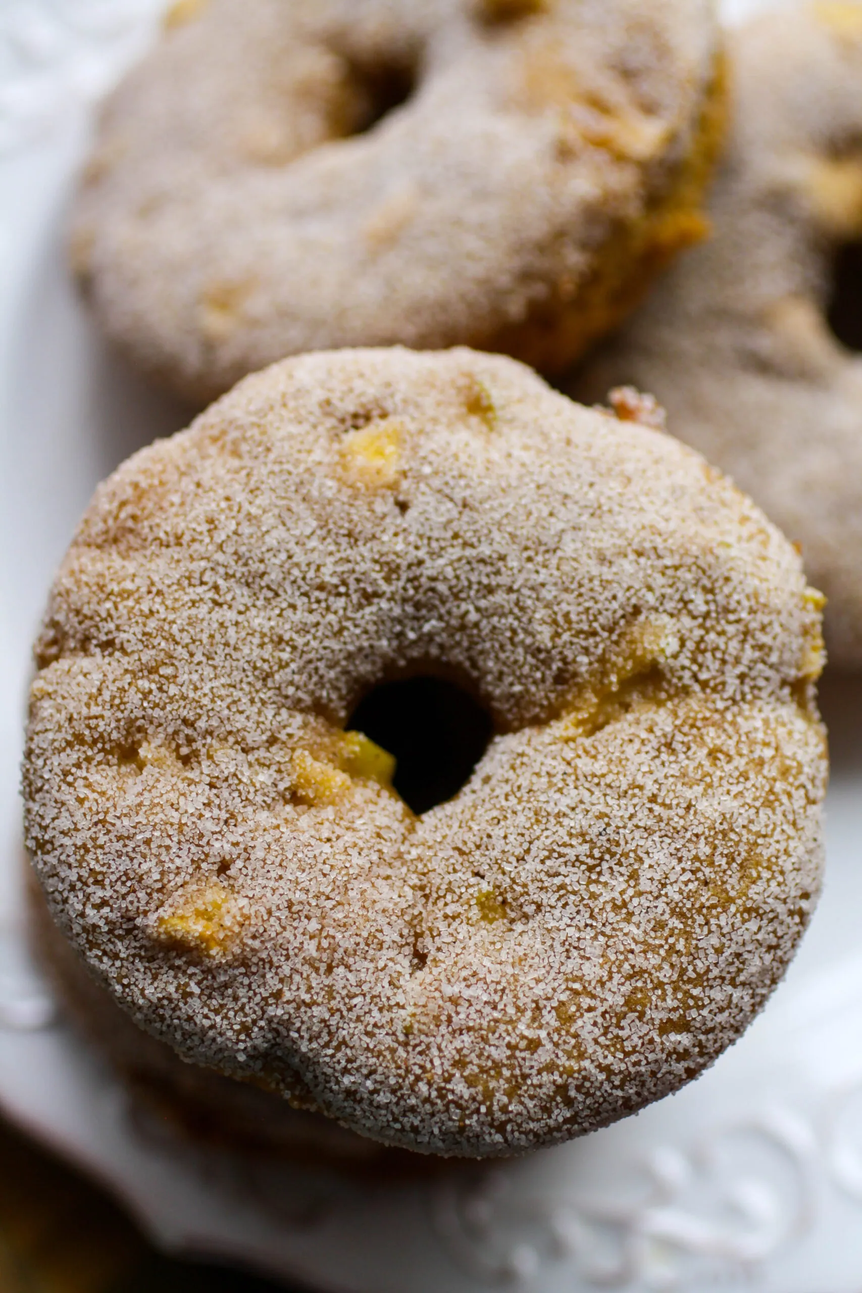 Baked Apple Cinnamon Donuts are great whether or not they're coated in cinnamon-sugar!