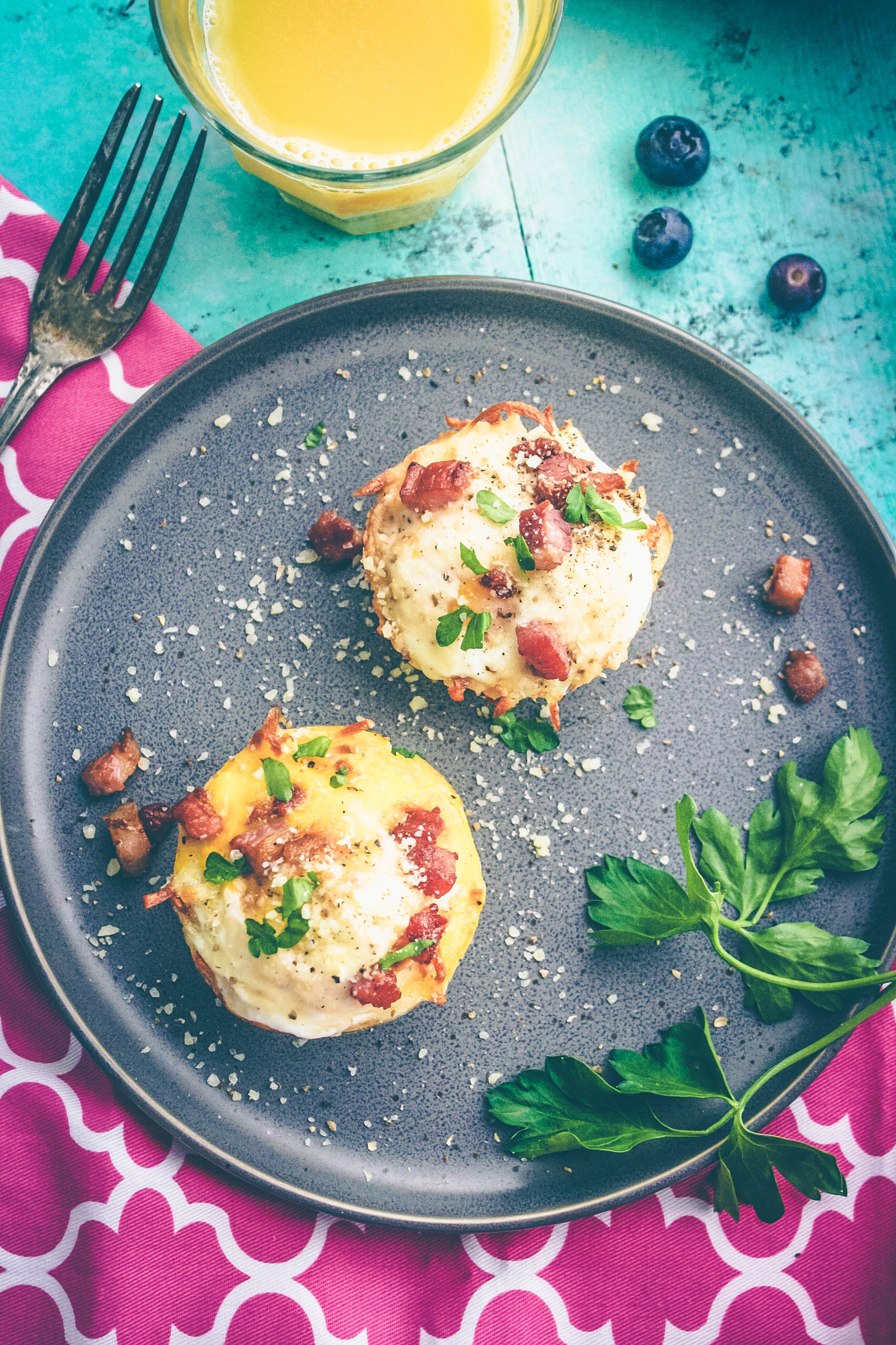 Baked Hash Brown Egg Cups with Parmesan and Pancetta are delicious and fun for breakfast. Baked Hash Brown Egg Cups with Parmesan and Pancetta make a great breakfast dish.