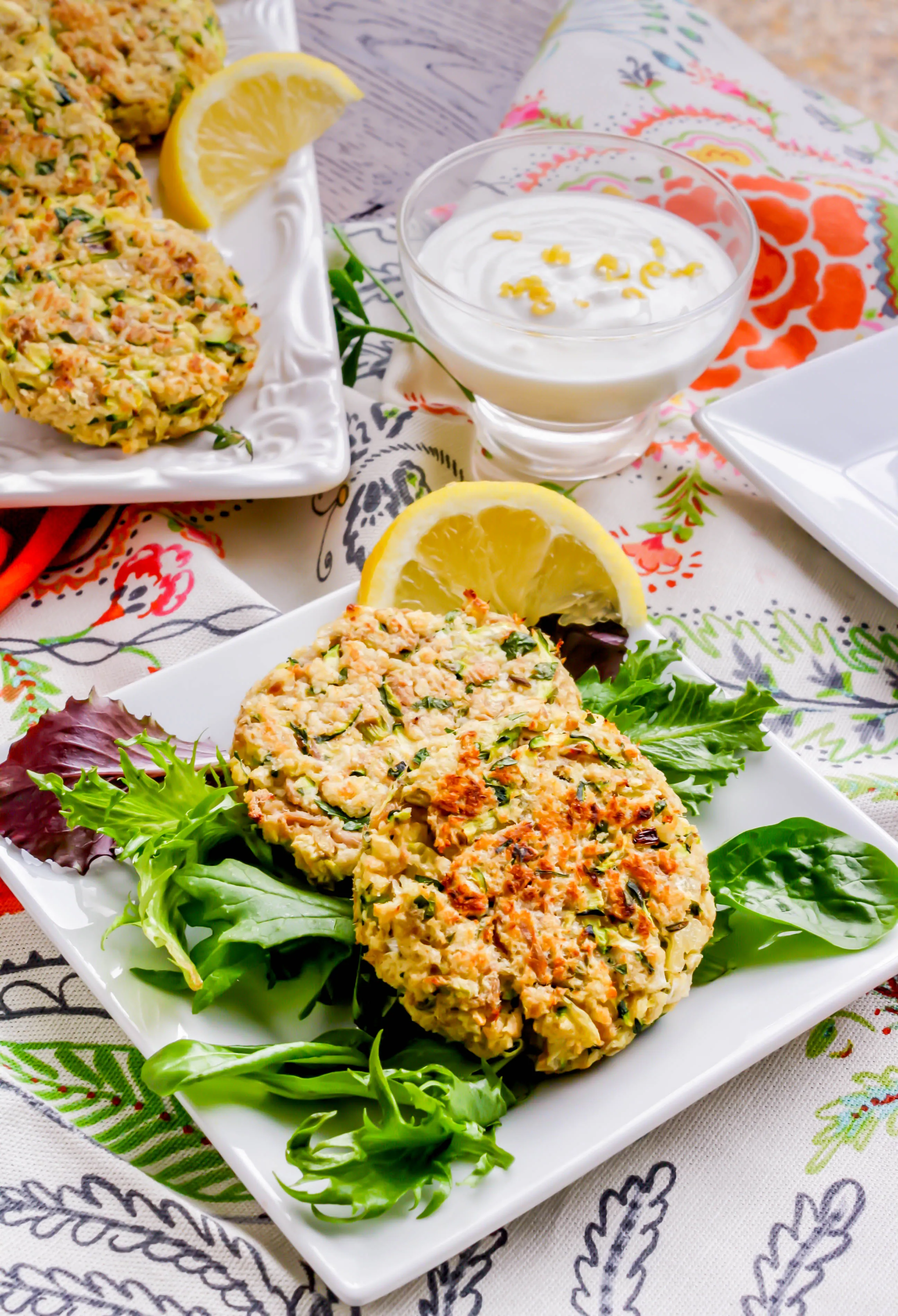 Baked Tuna and Zucchini Cakes with Lemon-Yogurt Dressing make a great snack or light meal. You'll love these Baked Tuna and Zucchini Cakes with Lemon-Yogurt Dressing.