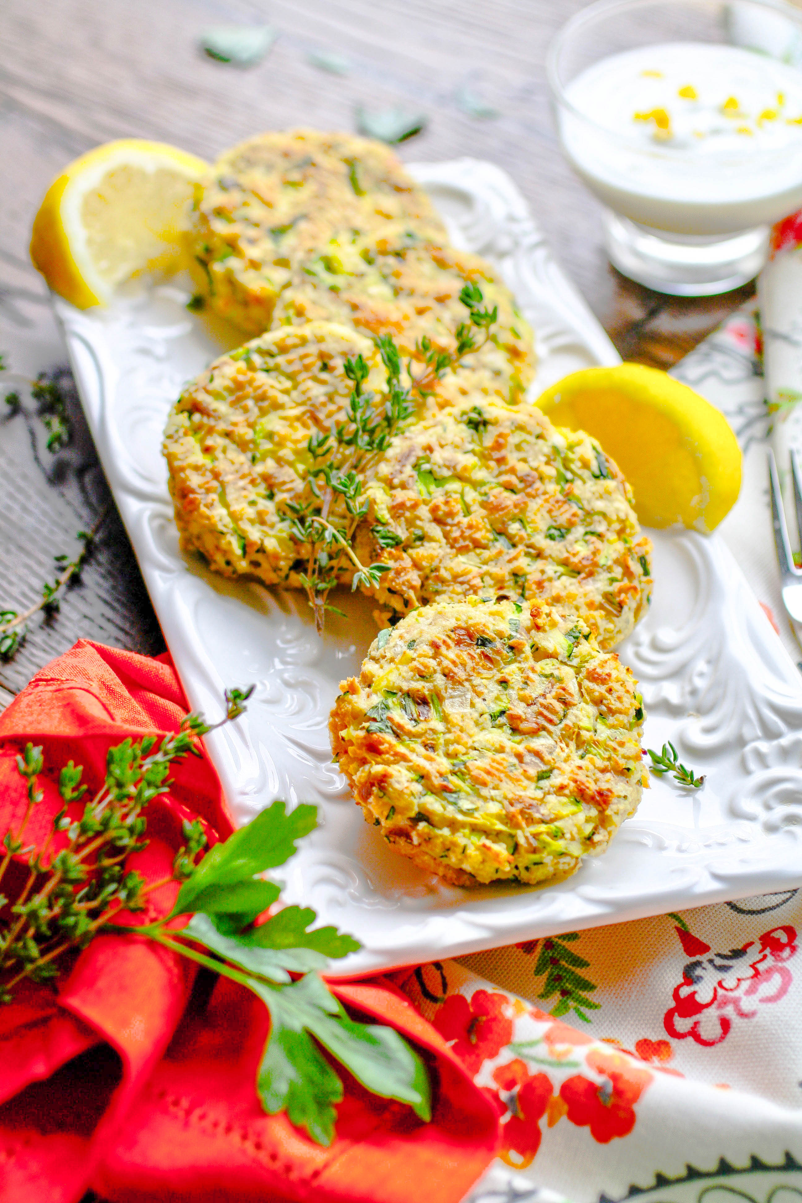 Baked Tuna and Zucchini Cakes with Lemon-Yogurt Dressing are lovely this time of year. Baked Tuna and Zucchini Cakes with Lemon-Yogurt Dressing are perfect as a snack or part of a lighter meal.