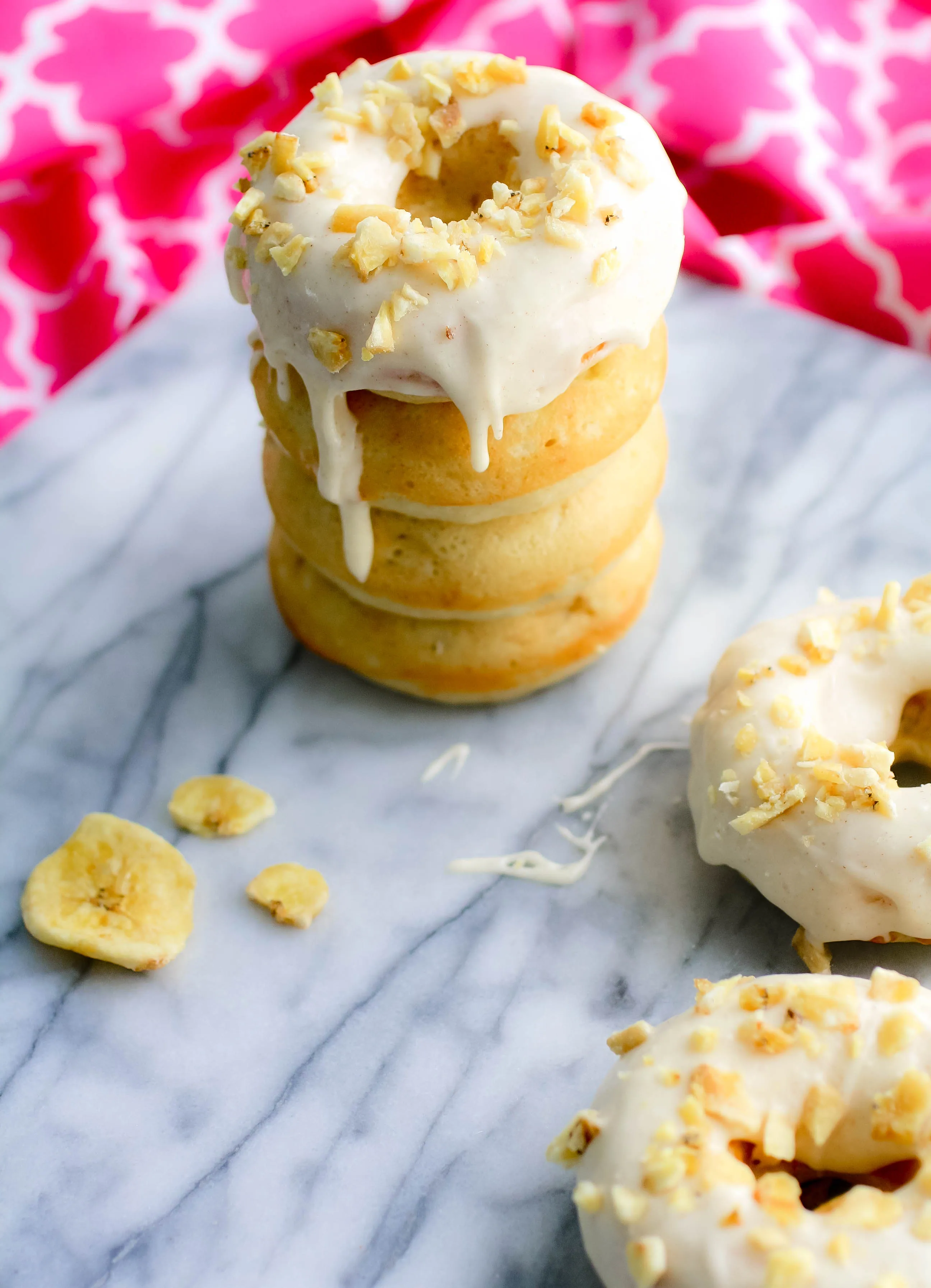 Banana Donuts with Cinnamon Cream Cheese Frosting are perfect for a sweet treat. Banana Donuts with Cinnamon Cream Cheese Frosting will bring a smile to your face -- they're so tasty!
