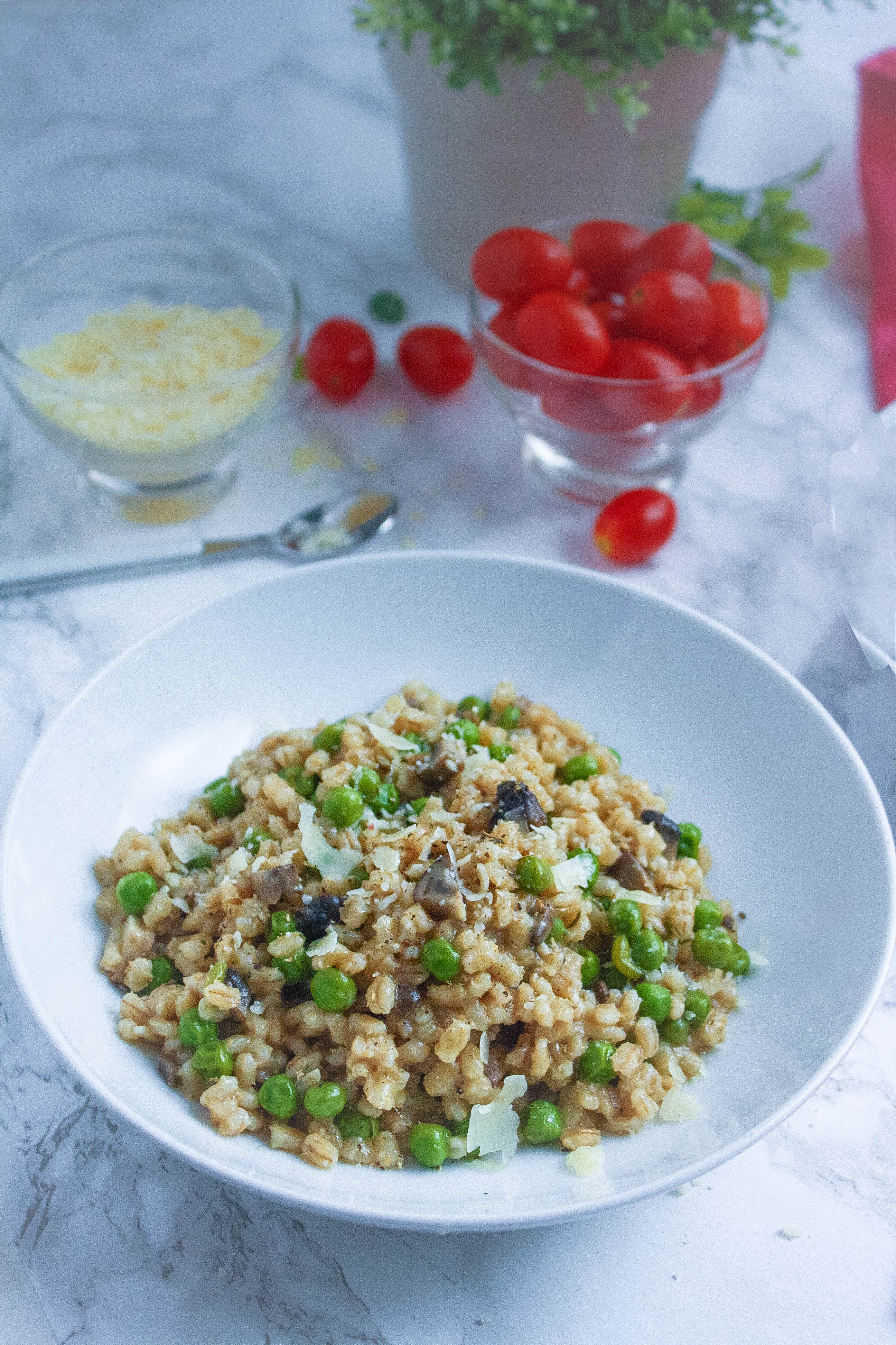 Barley Risotto with Mushrooms and Peas is a stick-to-your-ribs kind of dish you'll love! Barley Risotto with Mushrooms and Peas is hearty and so flavorful as a meatless dish.