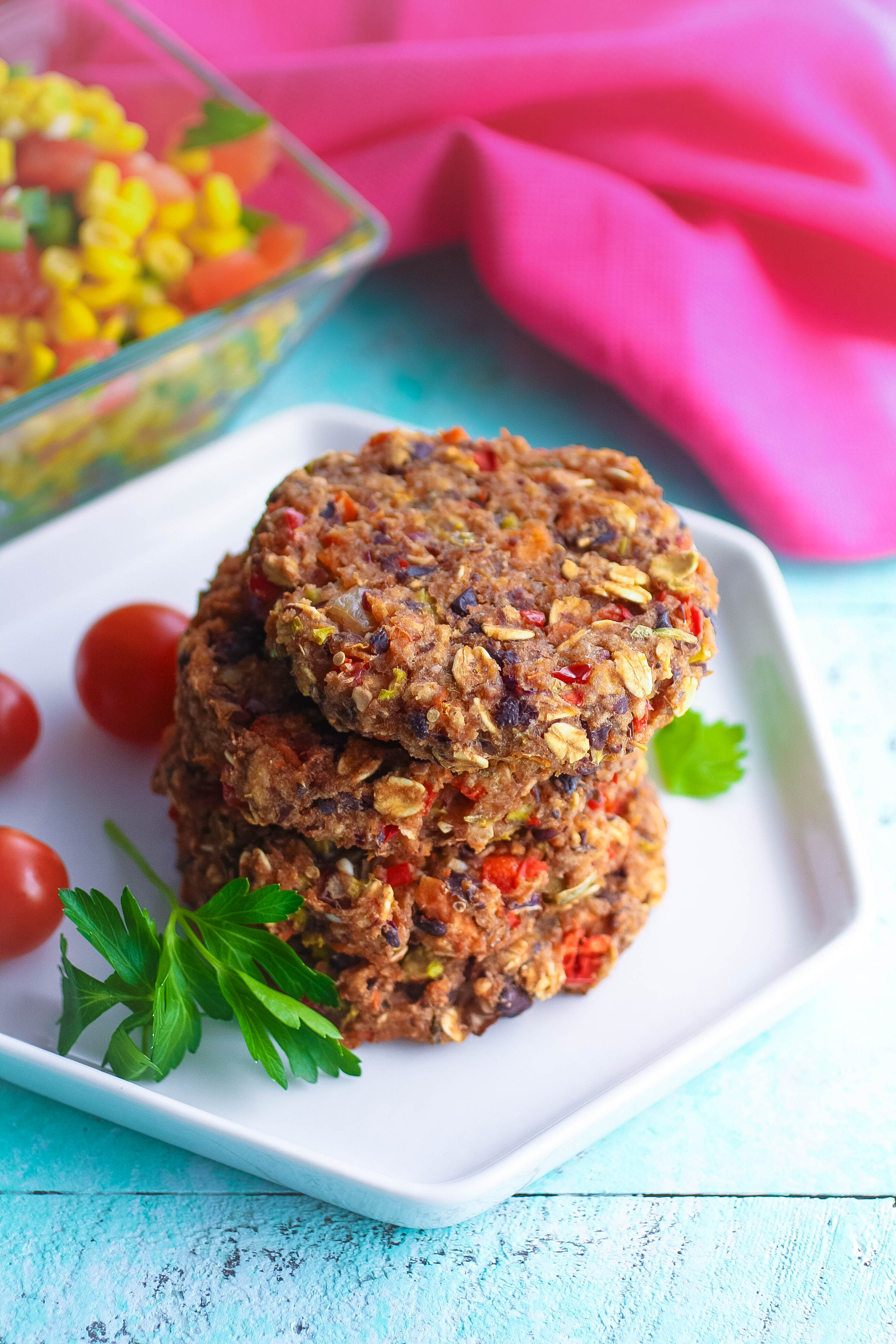 Black Bean Veggie Burgers with Corn Salsa stack up as a great meatless meal. These Black Bean Veggie Burgers with Corn Salsa are filling and flavorful!