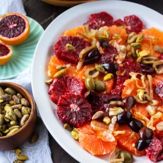 Blood Orange Salad with Shallots & Olives is bright and colorful with jewel-like oranges.