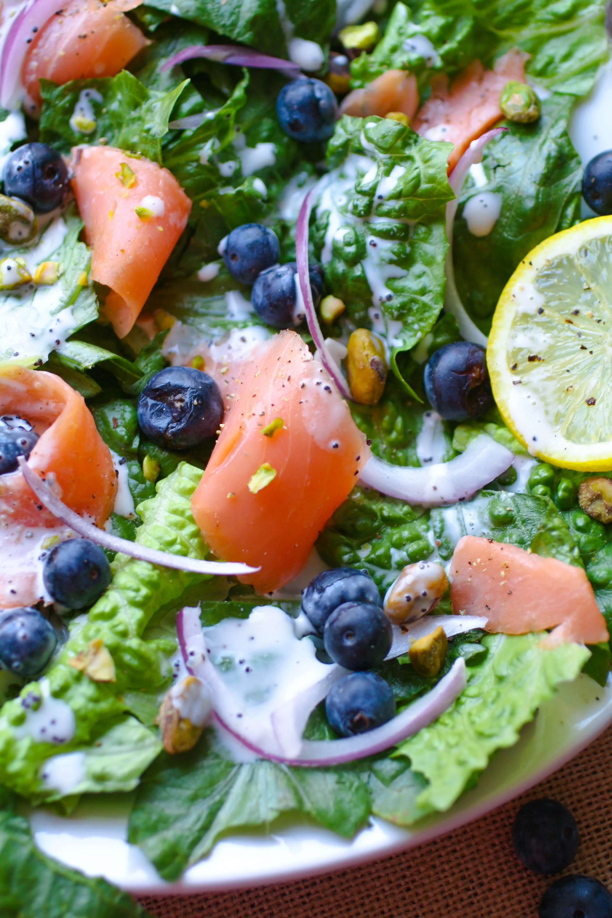 Smoked Salmon Salad with Blueberries and Lemon Poppy Seed Dressing is a filling meal. No oven required for this summer dish.