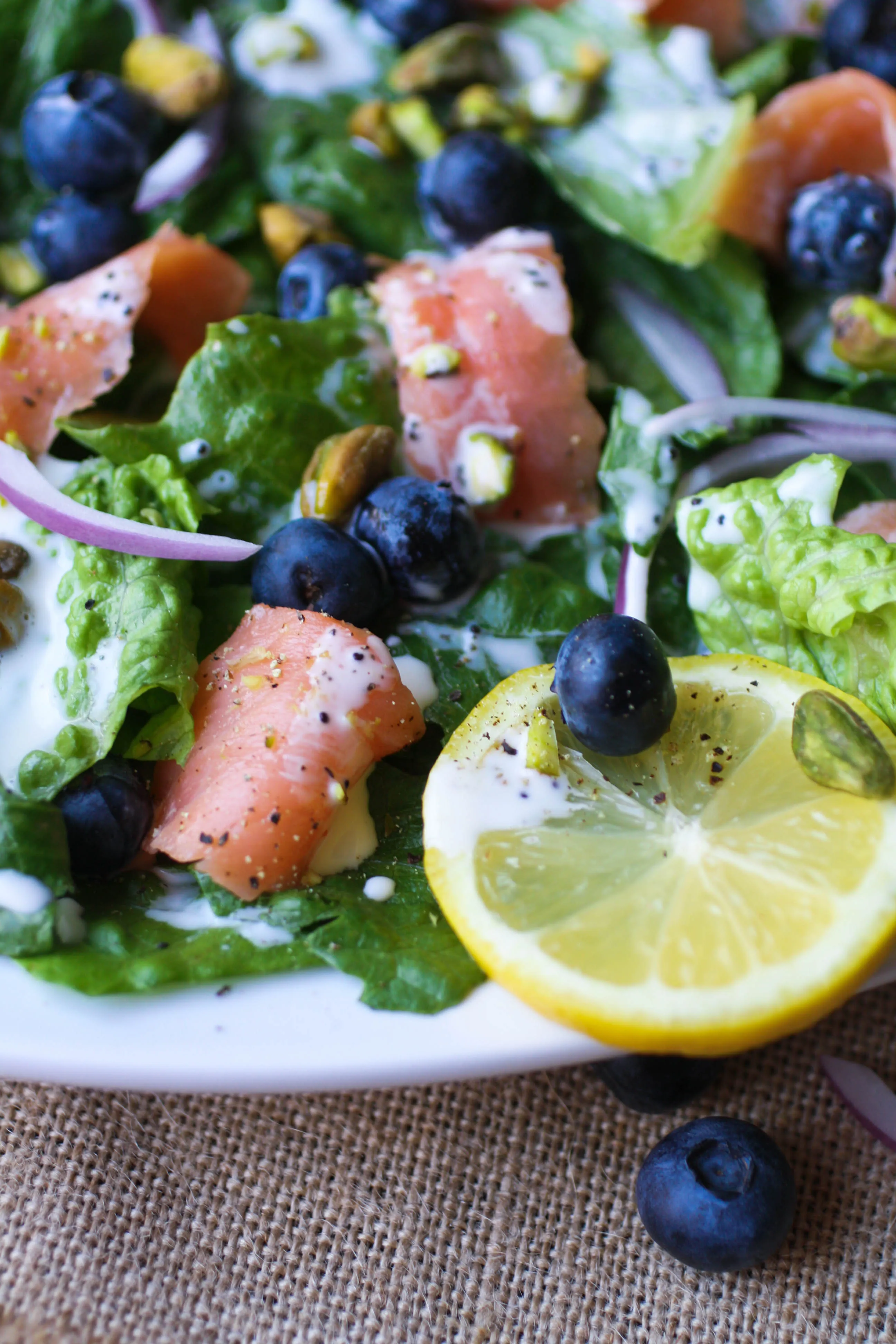 Smoked Salmon Salad with Blueberries and Lemon Poppy Seed Dressing makes wonderful summer meal. You won't even have to turn on the oven!