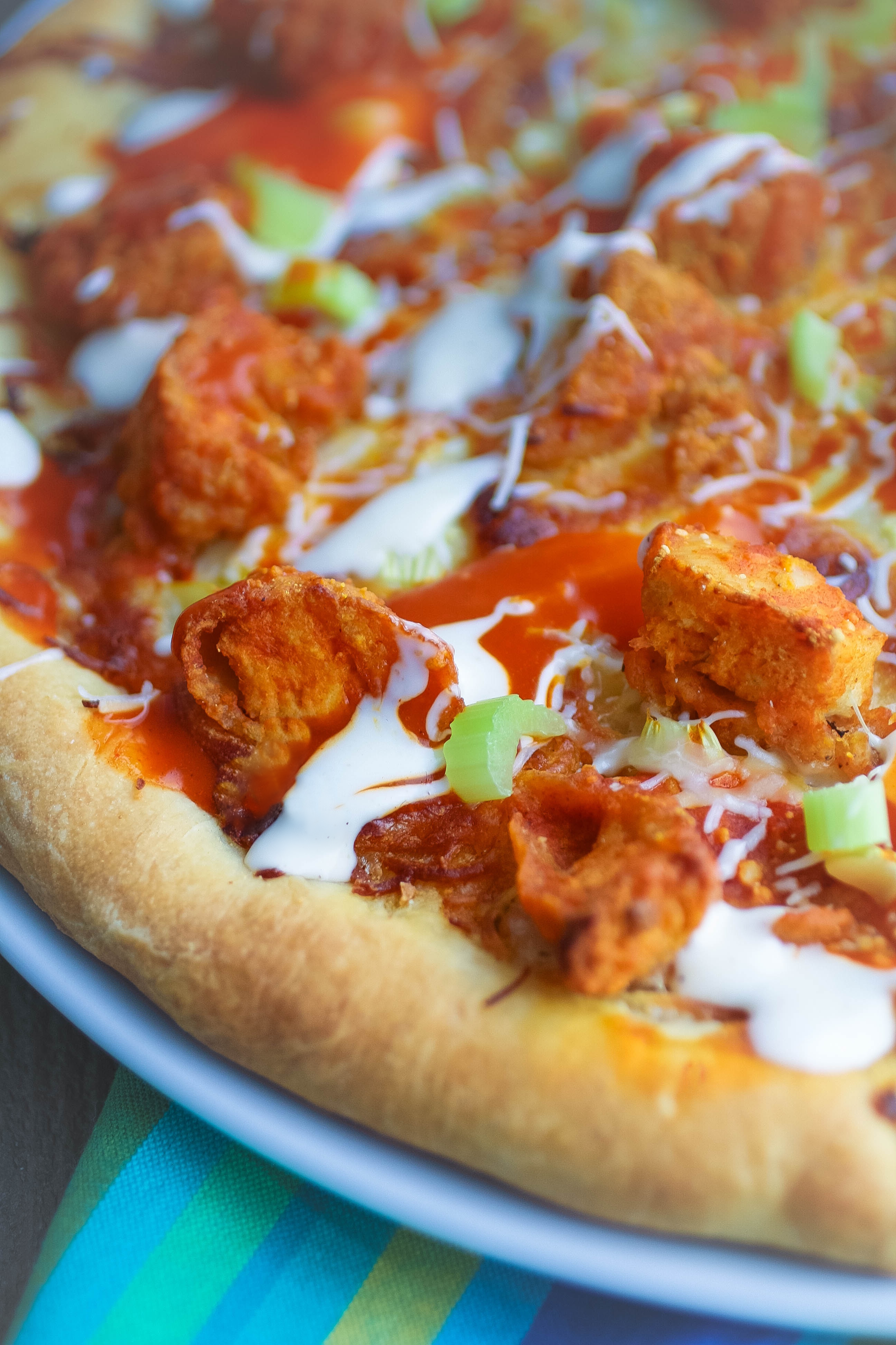 Buffalo Chicken Pizza is the best of both worlds: wings and pizza! You'll love this fun spin on pizza!