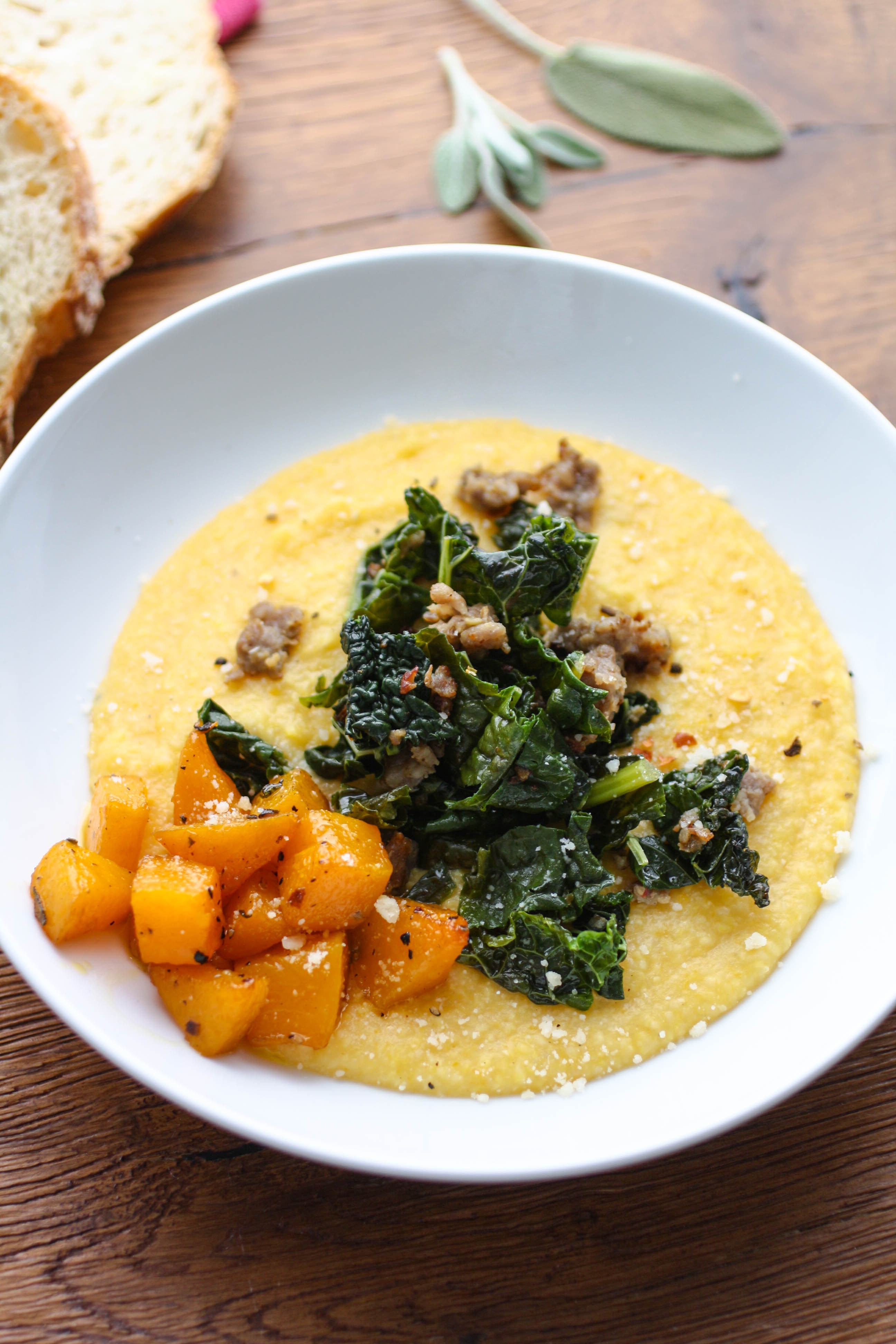 Butternut Squash Grits with Sausage and Kale is a comforting and delicious dish. You'll enjoy serving this grits dish on a chilly night.