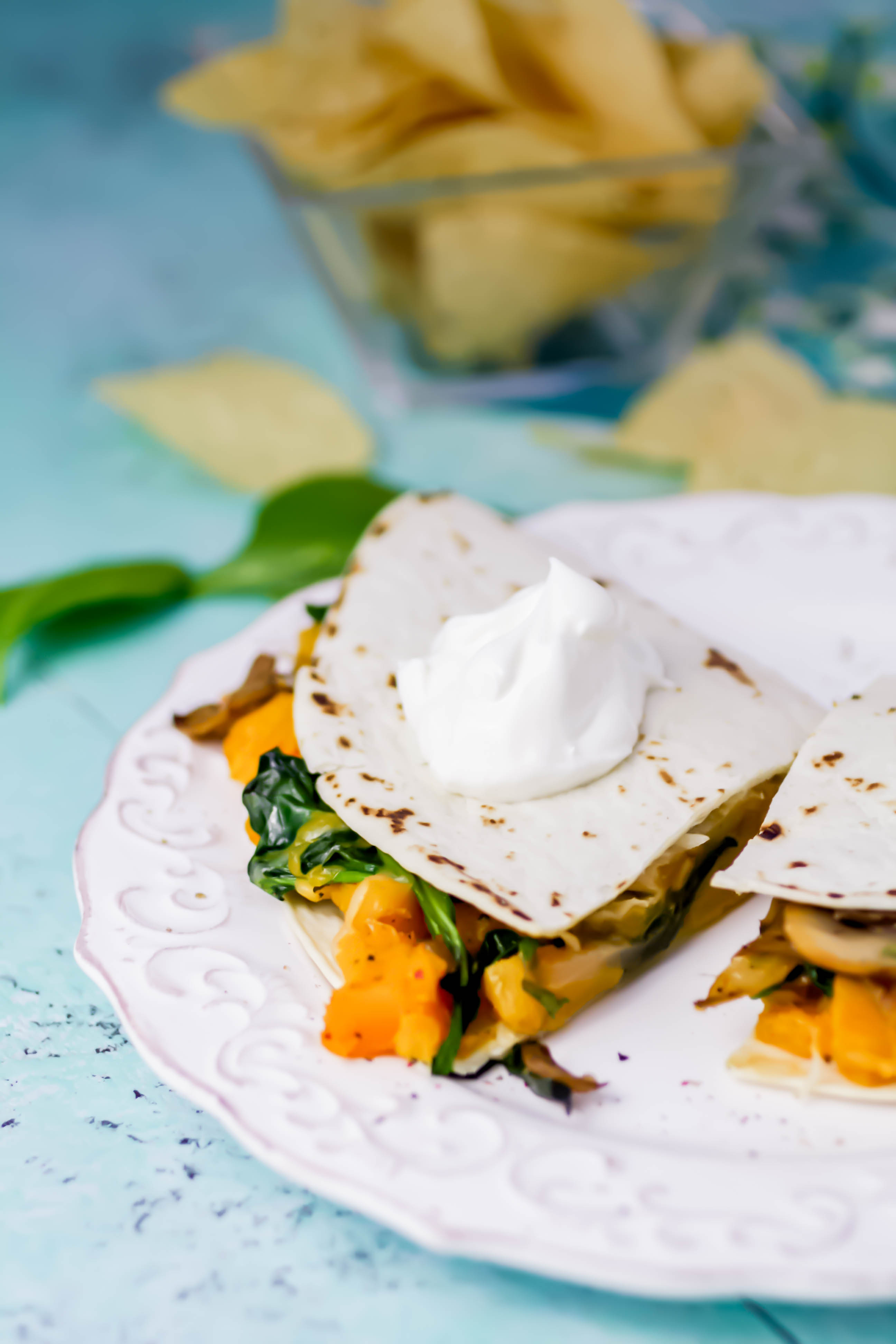 Butternut Squash, Mushroom, Onion, and Spinach Quesadillas make a simple, delicious meal. Butternut Squash, Mushroom, Onion, and Spinach Quesadillas are great as a meatless dish -- you won't miss the meat!