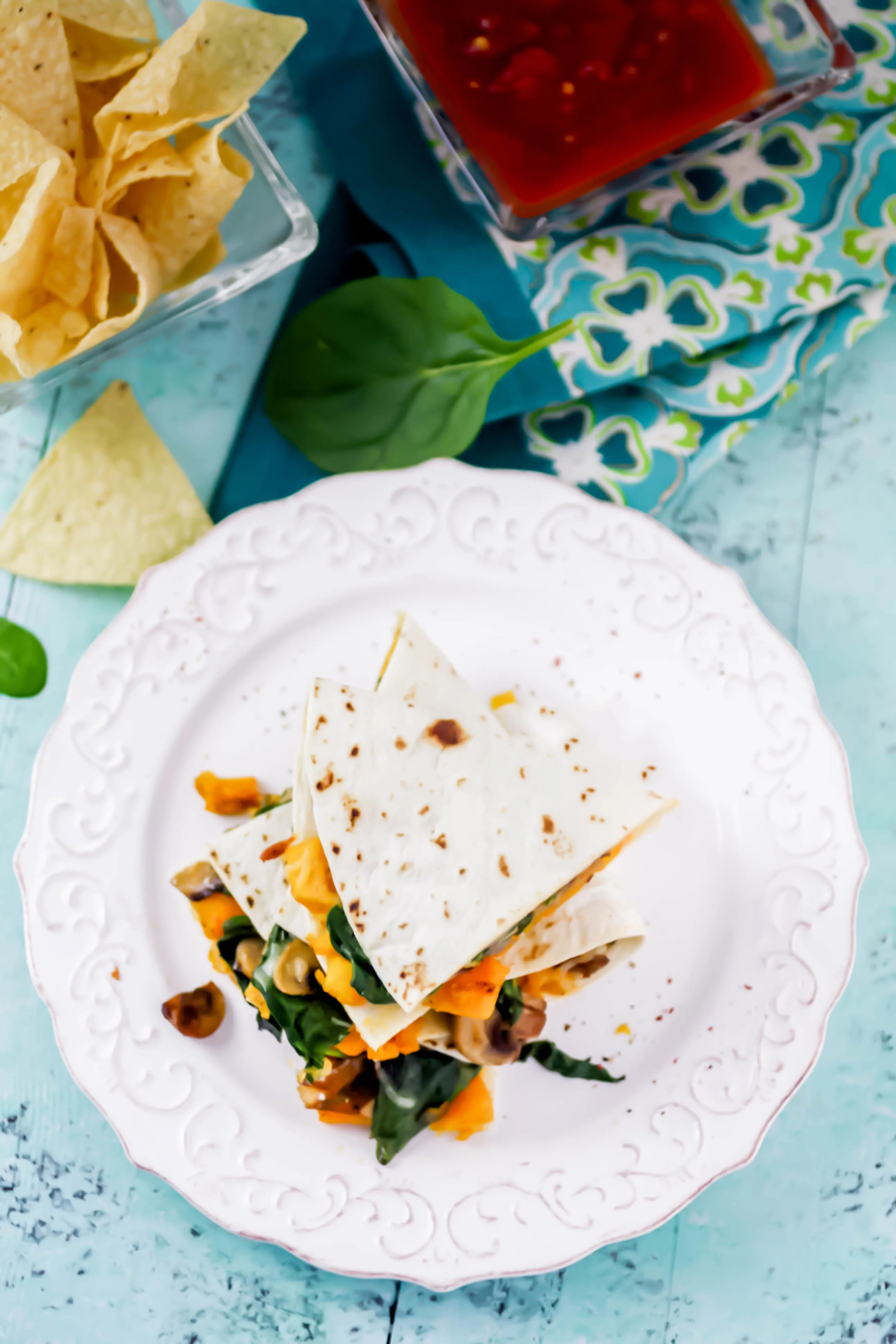Butternut Squash, Mushroom, Onion, and Spinach Quesadillas are a great easy-meal option. Butternut Squash, Mushroom, Onion, and Spinach Quesadillas include colorful and seasonal ingredients for a fabulous meal.
