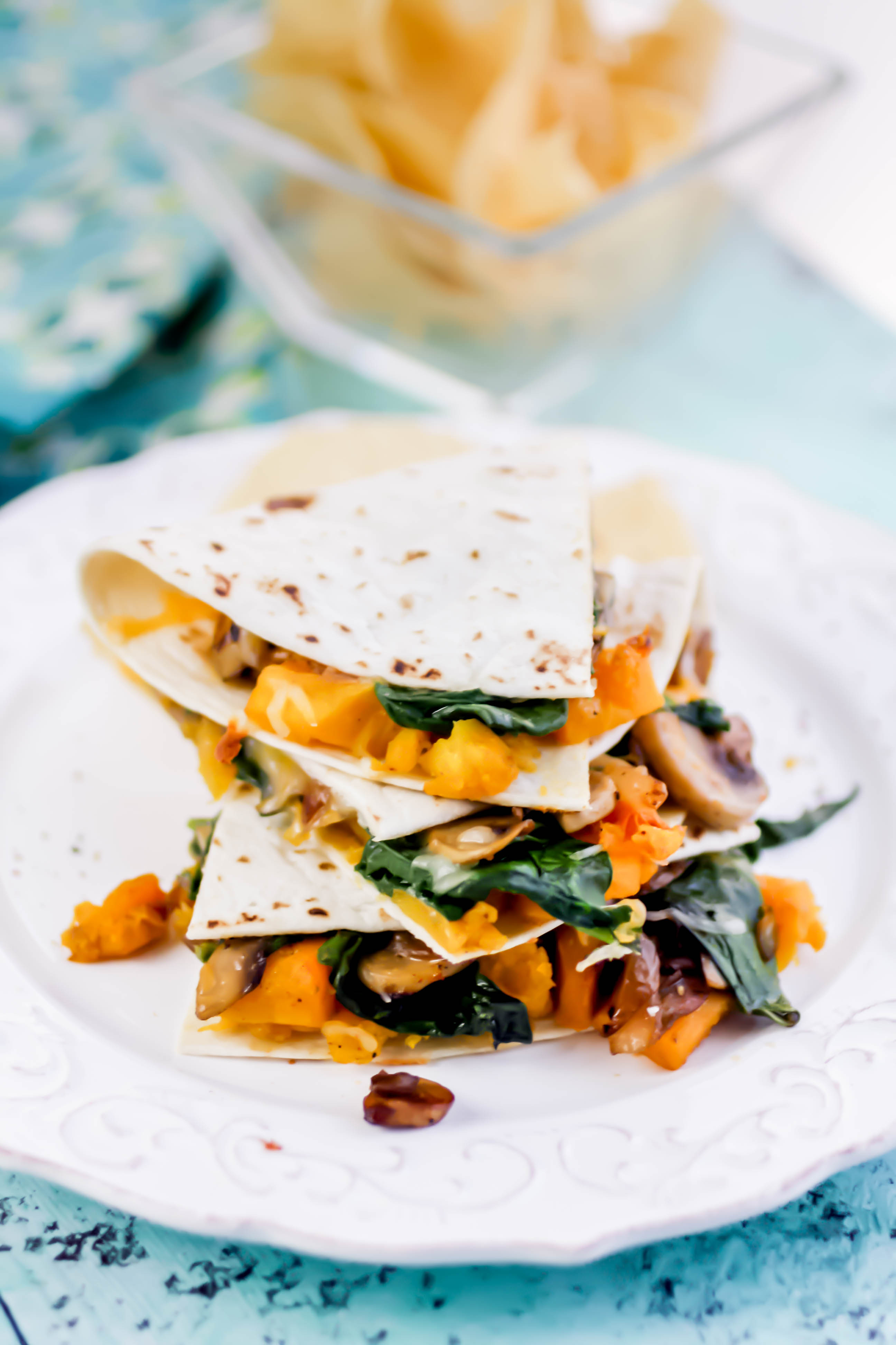 Butternut Squash, Mushroom, Onion, and Spinach Quesadillas are filling and delightful for any dinnertime menu! Butternut Squash, Mushroom, Onion, and Spinach Quesadillas are loaded with great ingredients for a tasty meal!