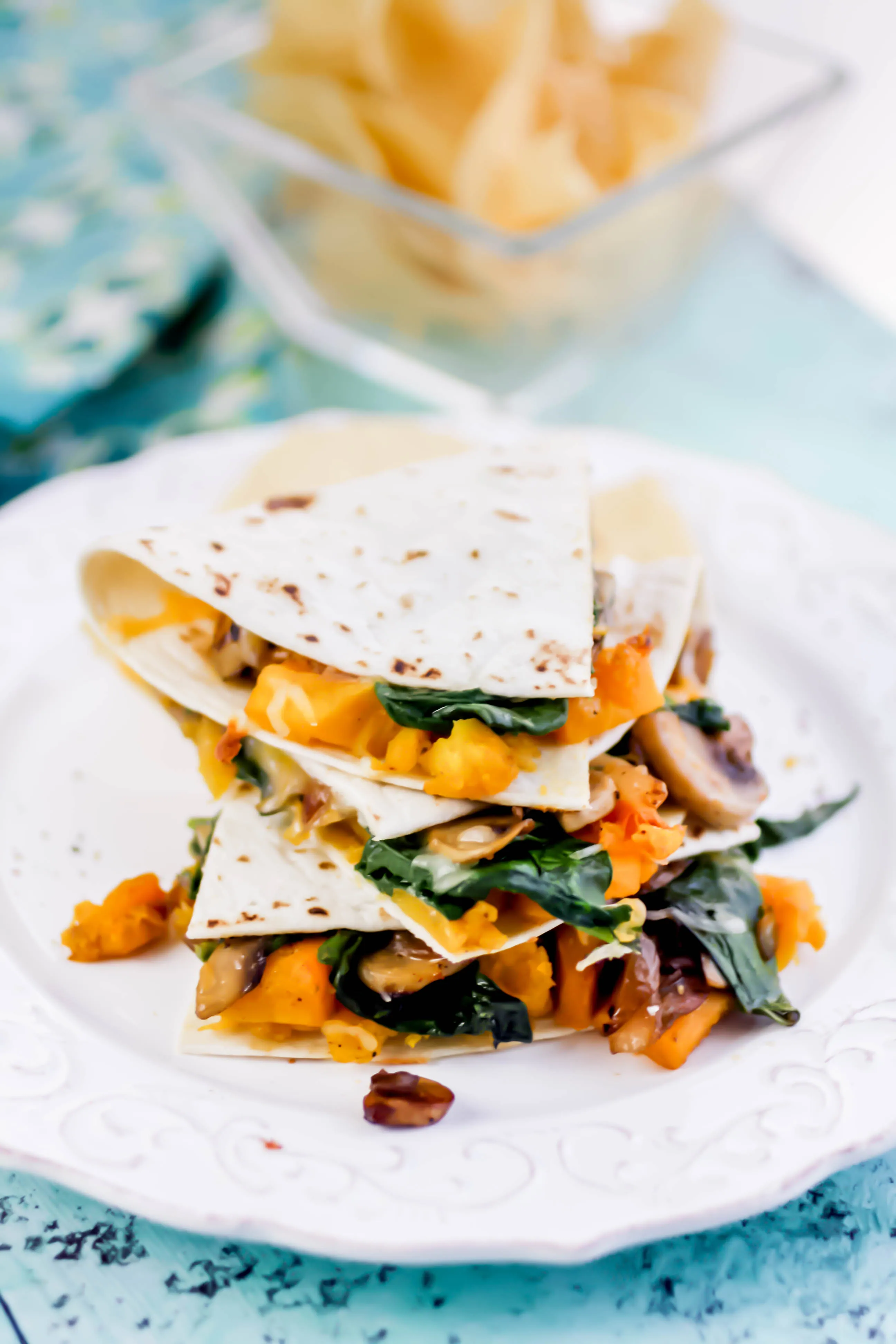 Butternut Squash, Mushroom, Onion, and Spinach Quesadillas are filling and delightful for any dinnertime menu! Butternut Squash, Mushroom, Onion, and Spinach Quesadillas are loaded with great ingredients for a tasty meal!