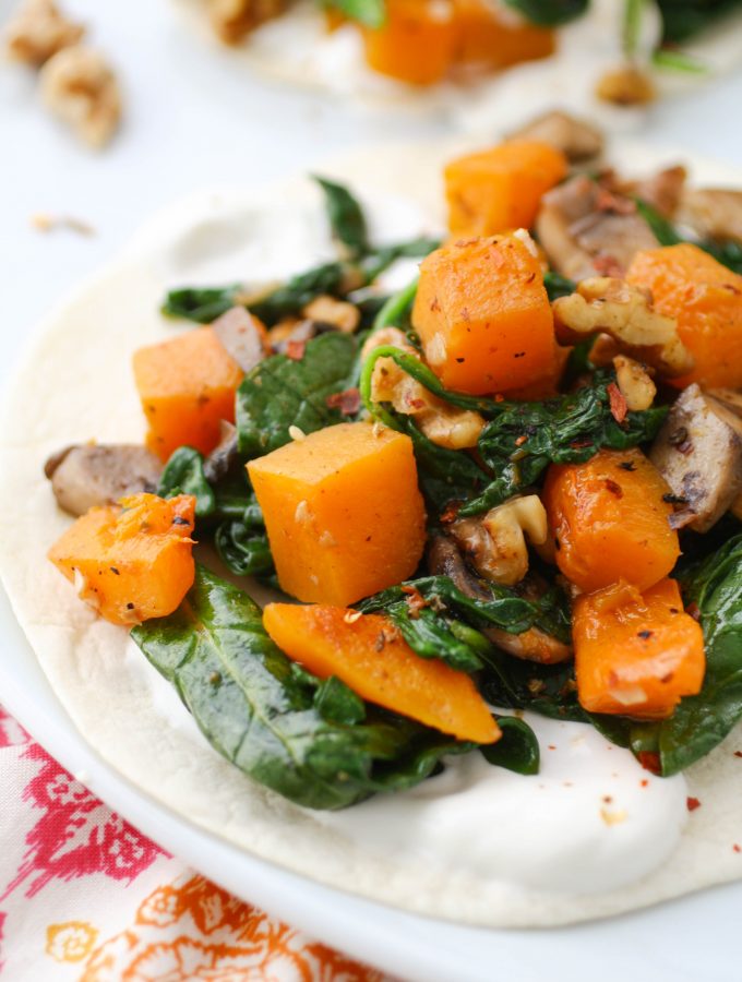 Butternut Squash, Spinach, and Mushroom Tacos are a seasonal favorite! You'll love these tacos any night of the week, but they're fab for a Meatless Monday!