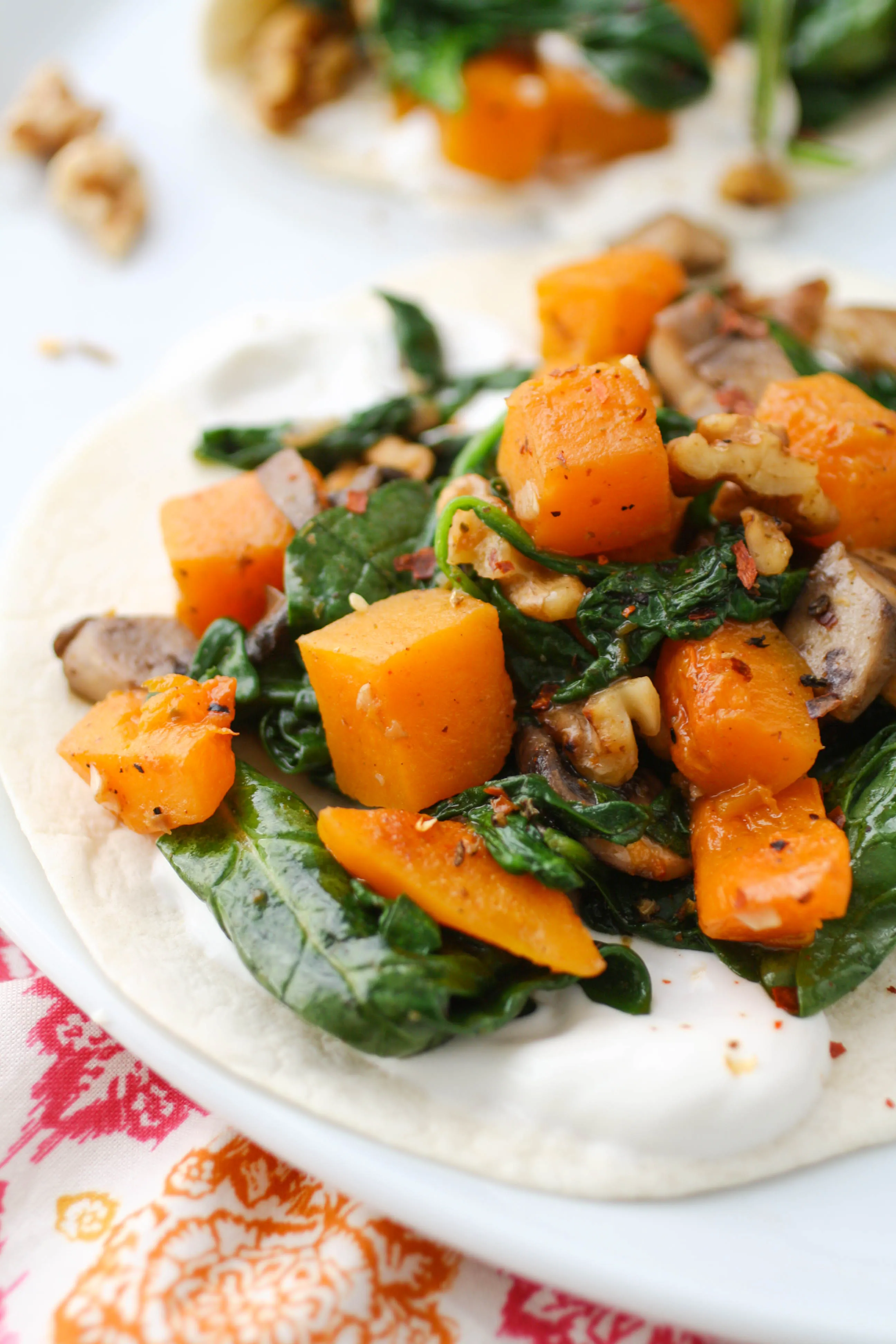 Butternut Squash, Spinach, and Mushroom Tacos are a seasonal favorite! You'll love these tacos any night of the week, but they're fab for a Meatless Monday!