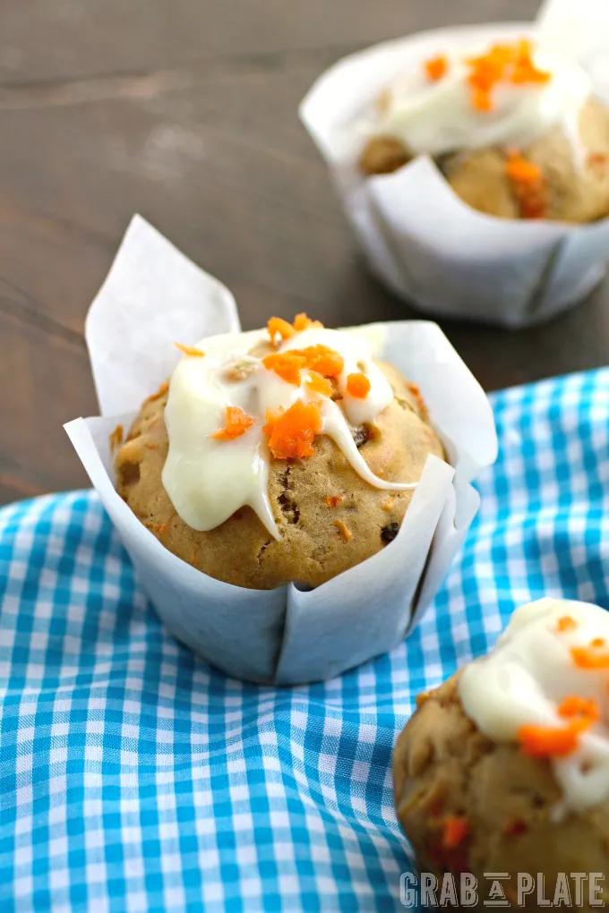 Enjoy a spring treat like Carrot Cake Muffins with Ginger-Cream Cheese Glaze. Delicious, and perfect for the season!