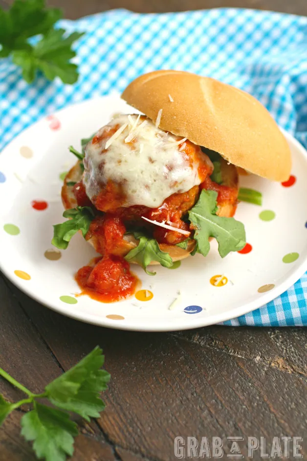 Serve sliders! Mozzarella-Stuffed Meatball Sliders are fun and delicious for any gathering!