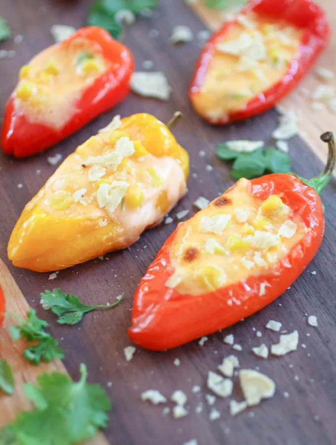 Cheesy Jalapeño & Corn Stuffed Sweet Pepper Poppers are a fun appetizer for sure. Cheesy Jalapeño & Corn Stuffed Sweet Pepper Poppers are great for parties and gatherings!