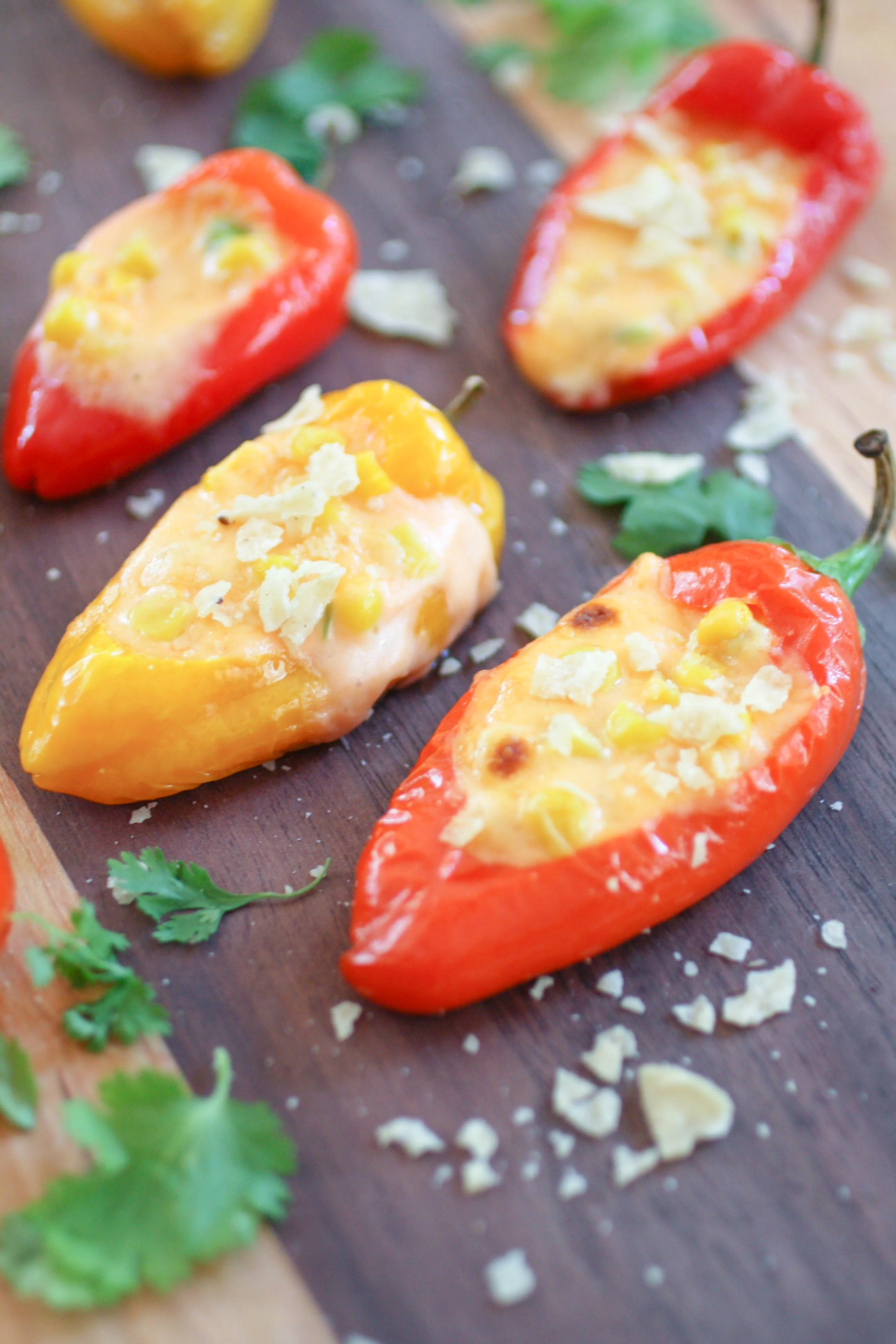 Cheesy Jalapeño & Corn Stuffed Sweet Pepper Poppers are a fun appetizer for sure. Cheesy Jalapeño & Corn Stuffed Sweet Pepper Poppers are great for parties and gatherings!