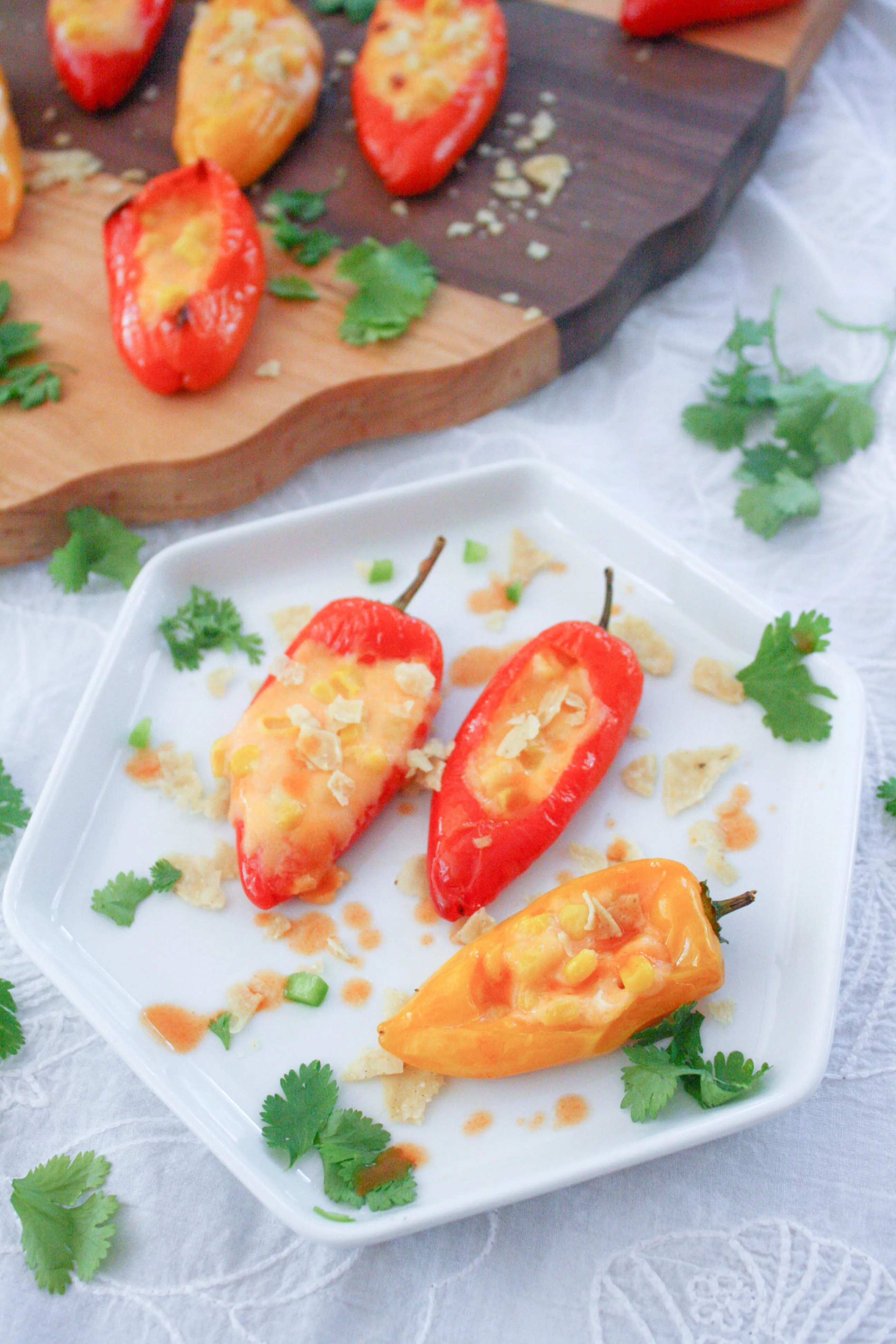 Cheesy Jalapeño & Corn Stuffed Sweet Pepper Poppers are the ultimate party food! Cheesy Jalapeño & Corn Stuffed Sweet Pepper Poppers are so fun to serve for your next party!