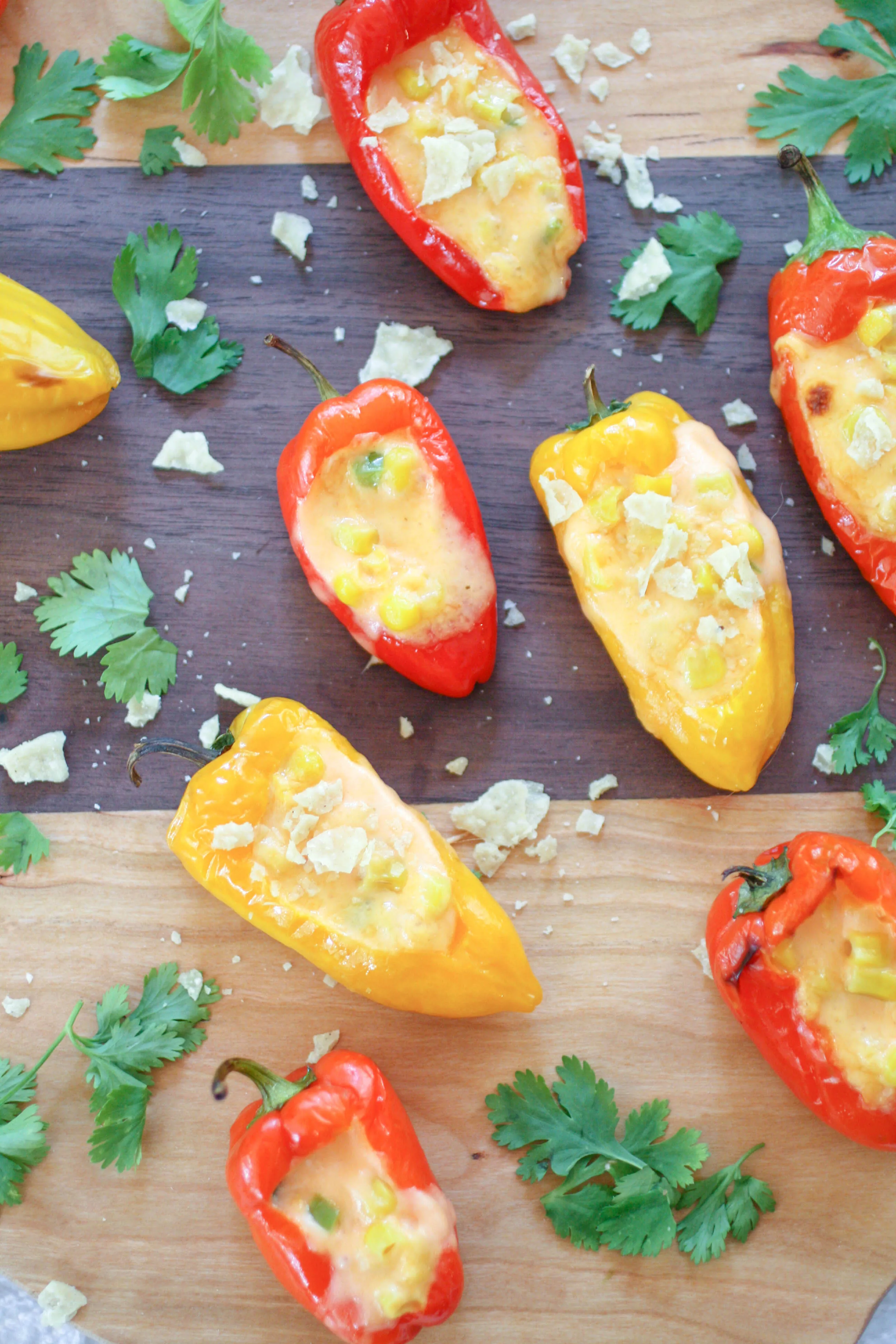 Cheesy Jalapeño & Corn Stuffed Sweet Pepper Poppers are colorful and delicious for your next appetizer! Cheesy Jalapeño & Corn Stuffed Sweet Pepper Poppers are easy to make for any gathering!