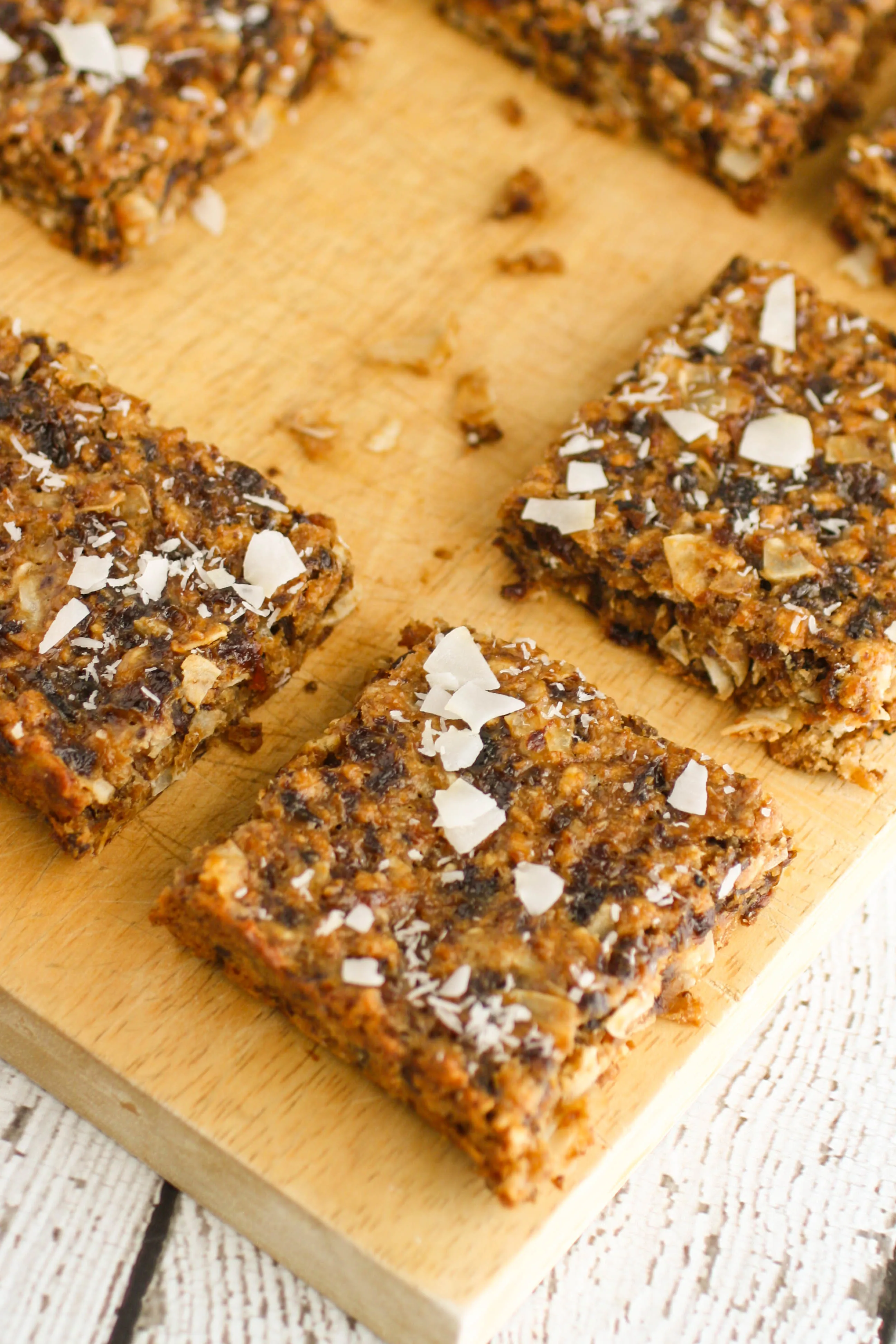 Chewy Coconut and Dried Fruit Bars are a great treat with a healthy vibe. You'll love these chewy coconut bars with dried fruit for their flavor and healthy vibe.