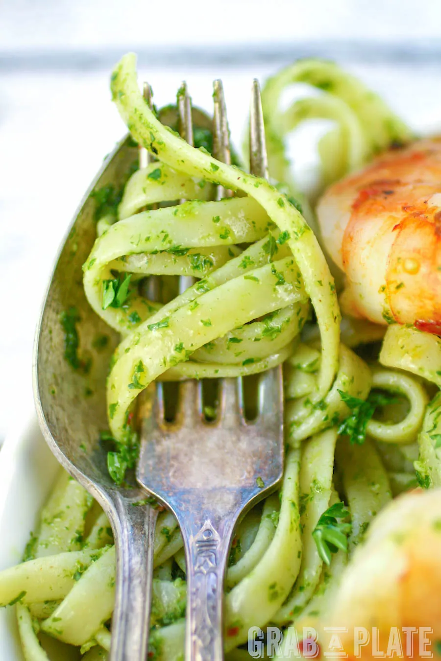Chimichurri Pasta with Grilled Spicy Shrimp is a delicious dish for dinner. Twirl up a forkful of Chimichurri Pasta with Grilled Spicy Shrimp at your next meal.