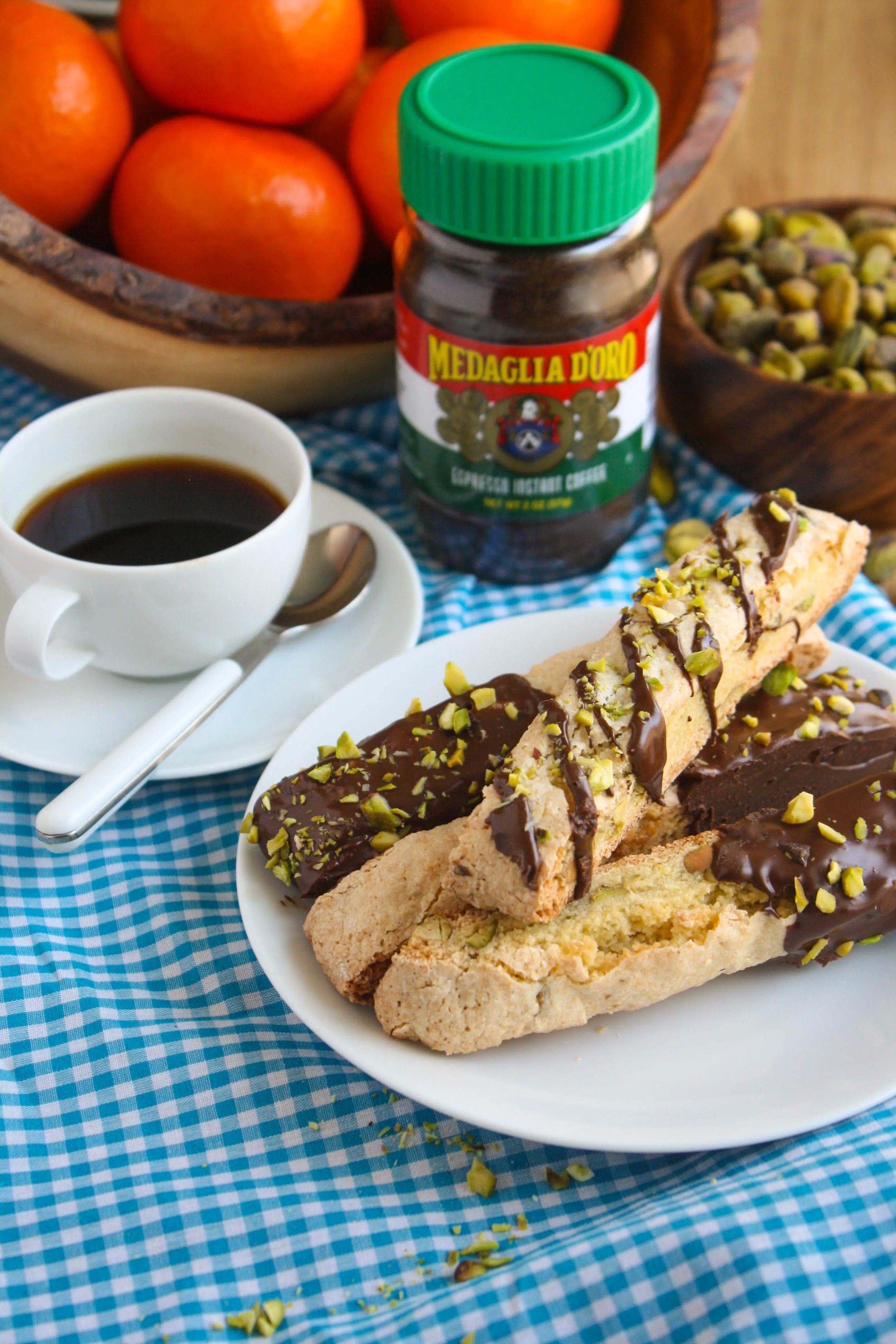 Chocolate-Espresso Dipped Orange and Pistachio Biscotti are such tasty cookies! You could serve these treats anytime, even at breakfast with coffee, or for dessert!