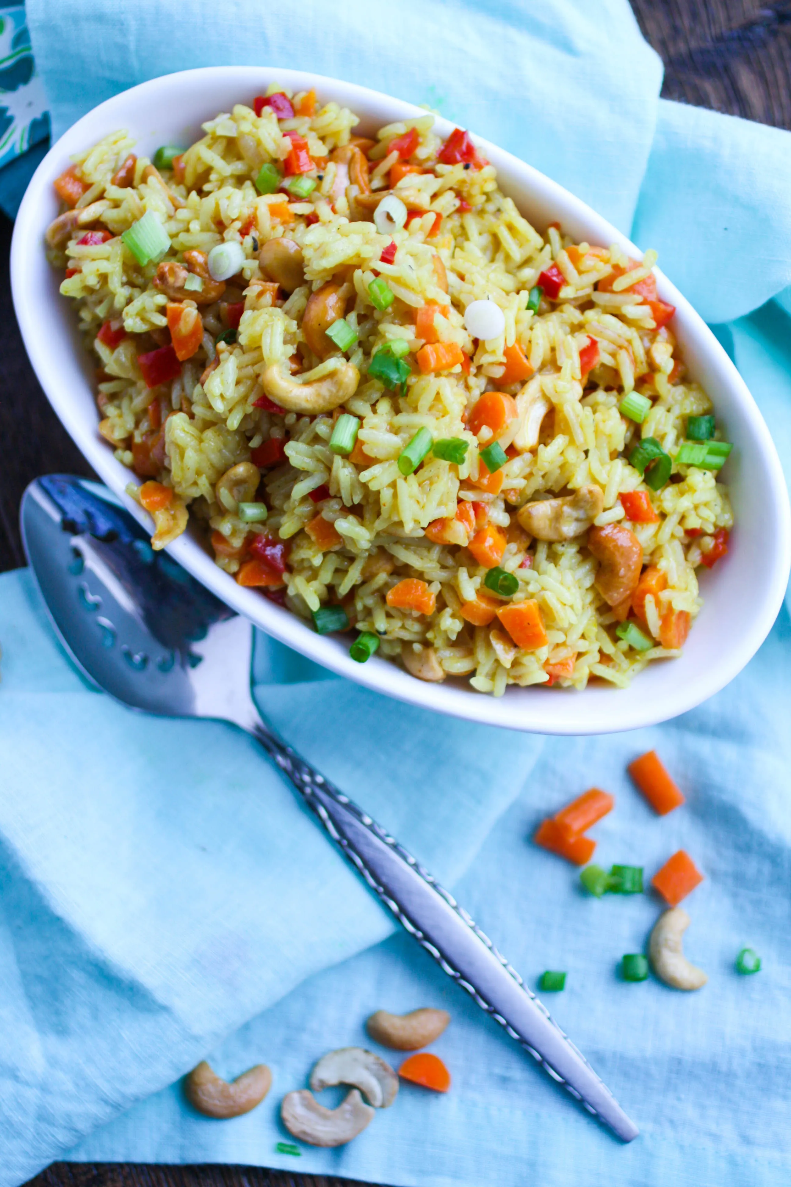 Coconut Carrot and Cashew Rice Pilaf is a great side dish that's easy to make. Use the staples from your pantry to put this rice dish together!