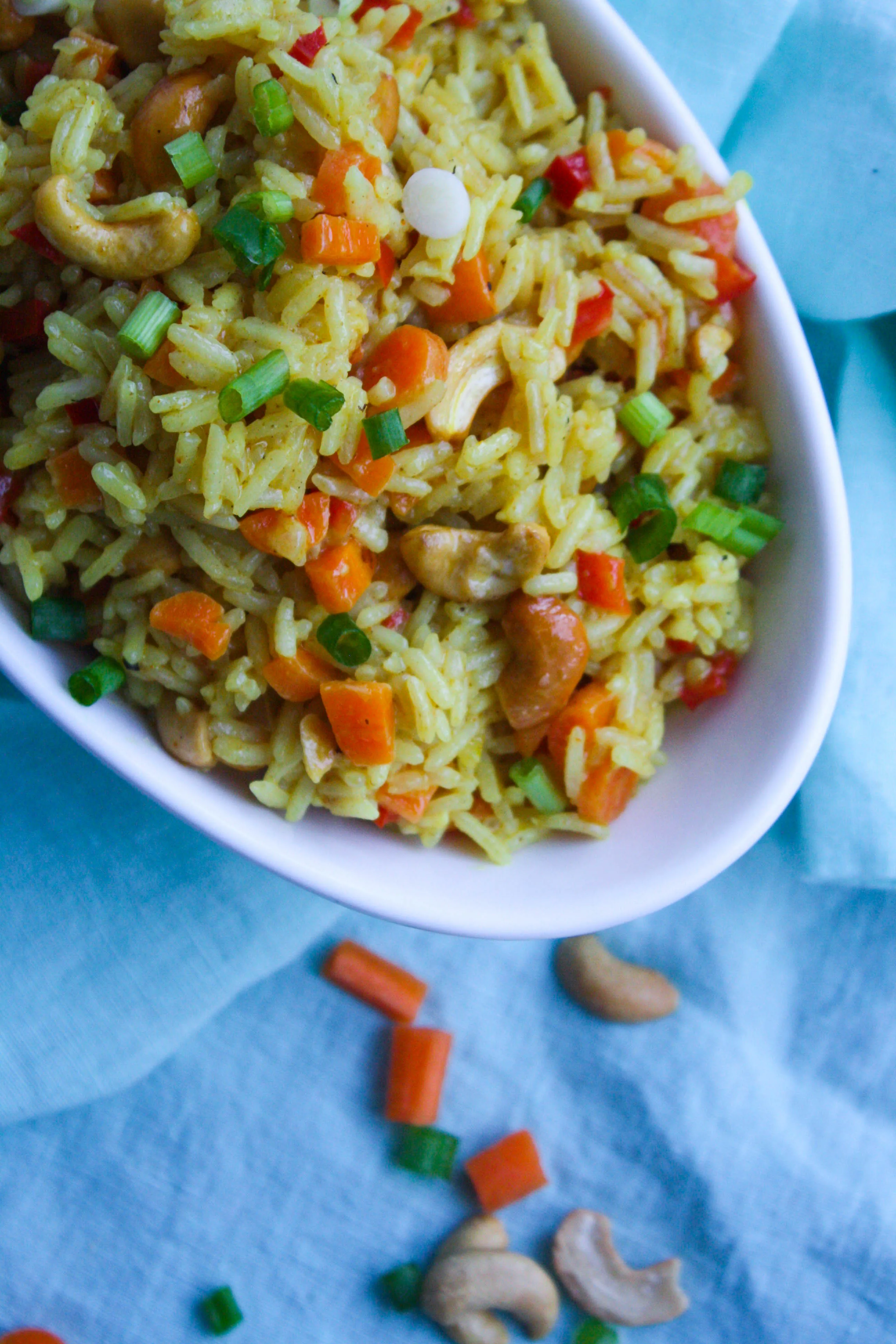 Coconut Carrot and Cashew Rice Pilaf is a fabulous and flavorful side dish. You'll love how easy this rice pilaf is to make, too!