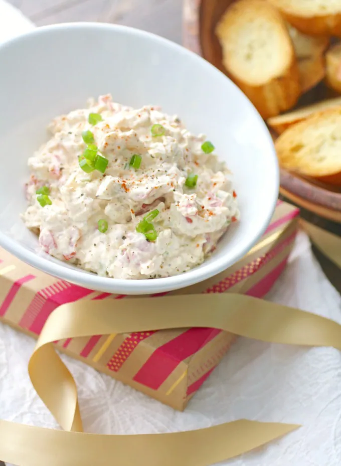 Perfect for parties or potlucks, Creamy Artichoke and Roasted Red Pepper Spread is what you need for a fun time!