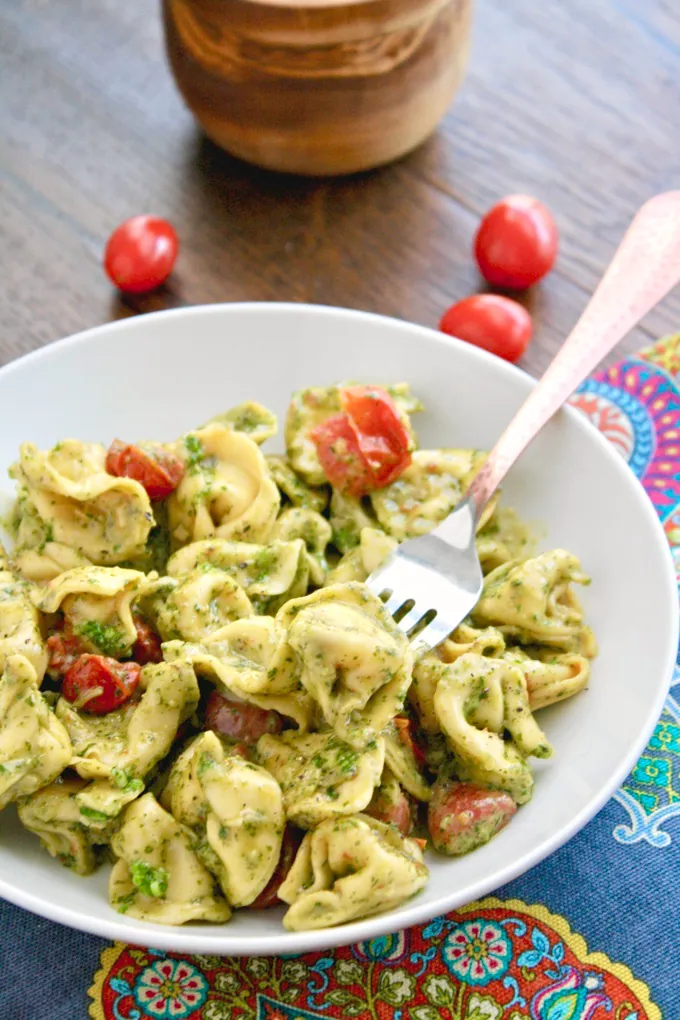 Creamy Skillet Tortellini with Arugula Pesto makes a quick meal. Easy to make and big on flavor!