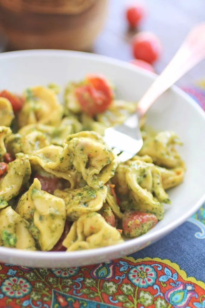 Creamy Skillet Tortellini with Arugula Pesto is a fabulous dish! It makes a great meatless meal, too!