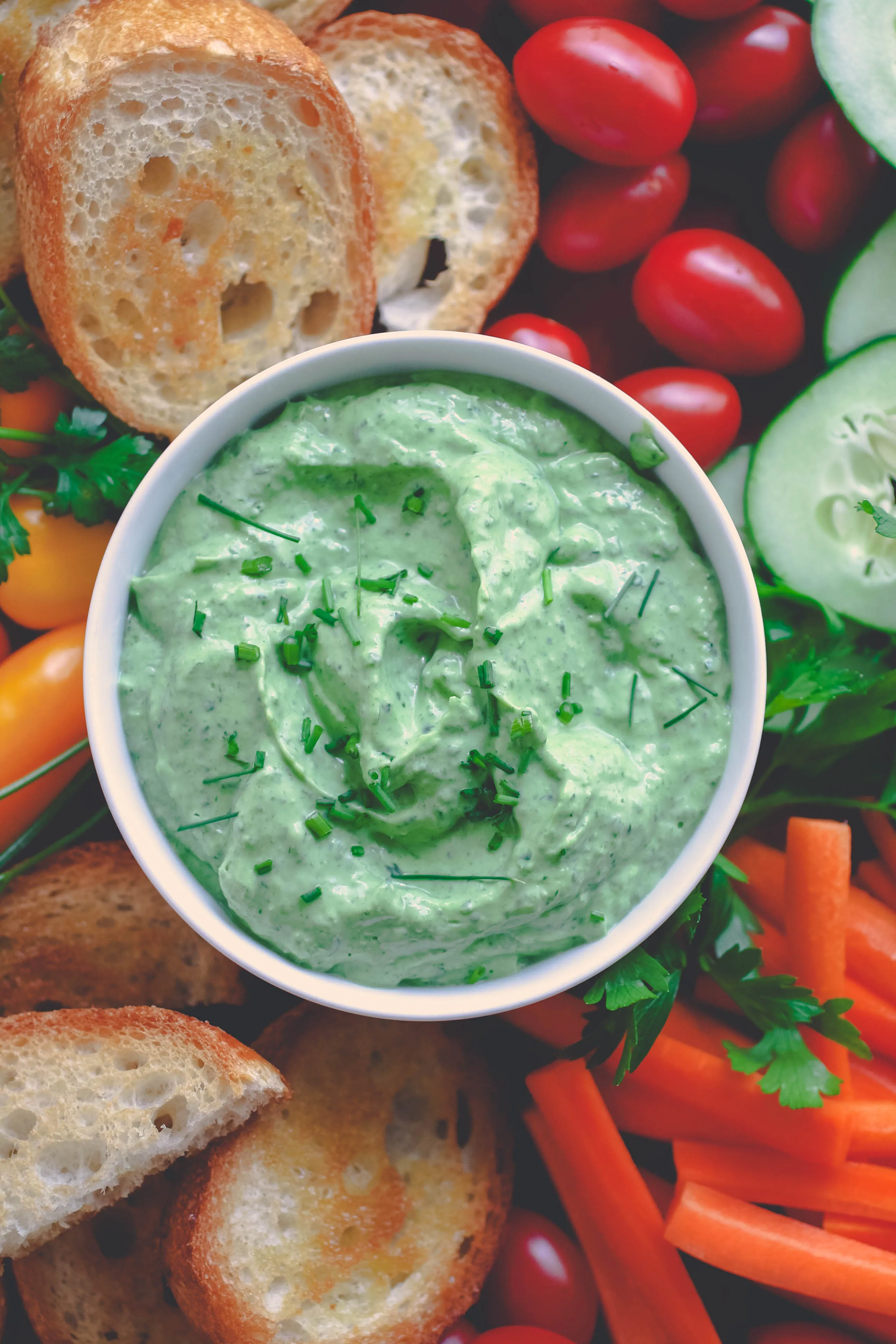 Creamy Green Goddess Dip makes a great after school snack or game day dip! Creamy Green Goddess Dip is easy to make and full of fresh flavors!