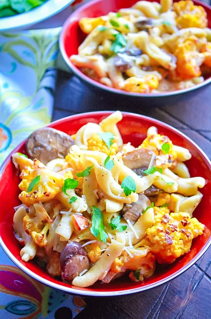 Creamy Pasta with Roasted Cauliflower and Mushrooms is a delightful dish for any meal. Everyone will love the flavors of Creamy Pasta with Roasted Cauliflower and Mushrooms.